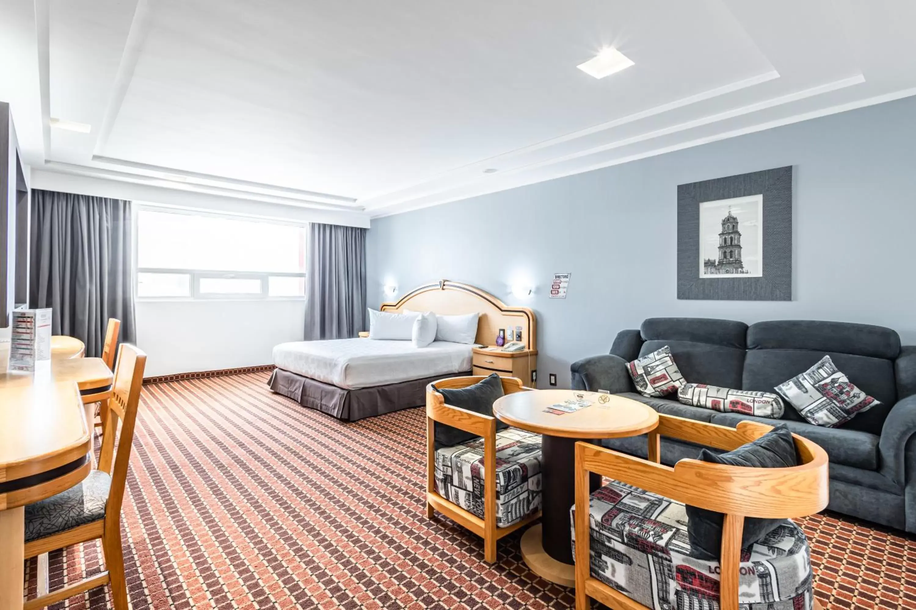 Bedroom in Suites Inn la Muralla Hotel & Spa