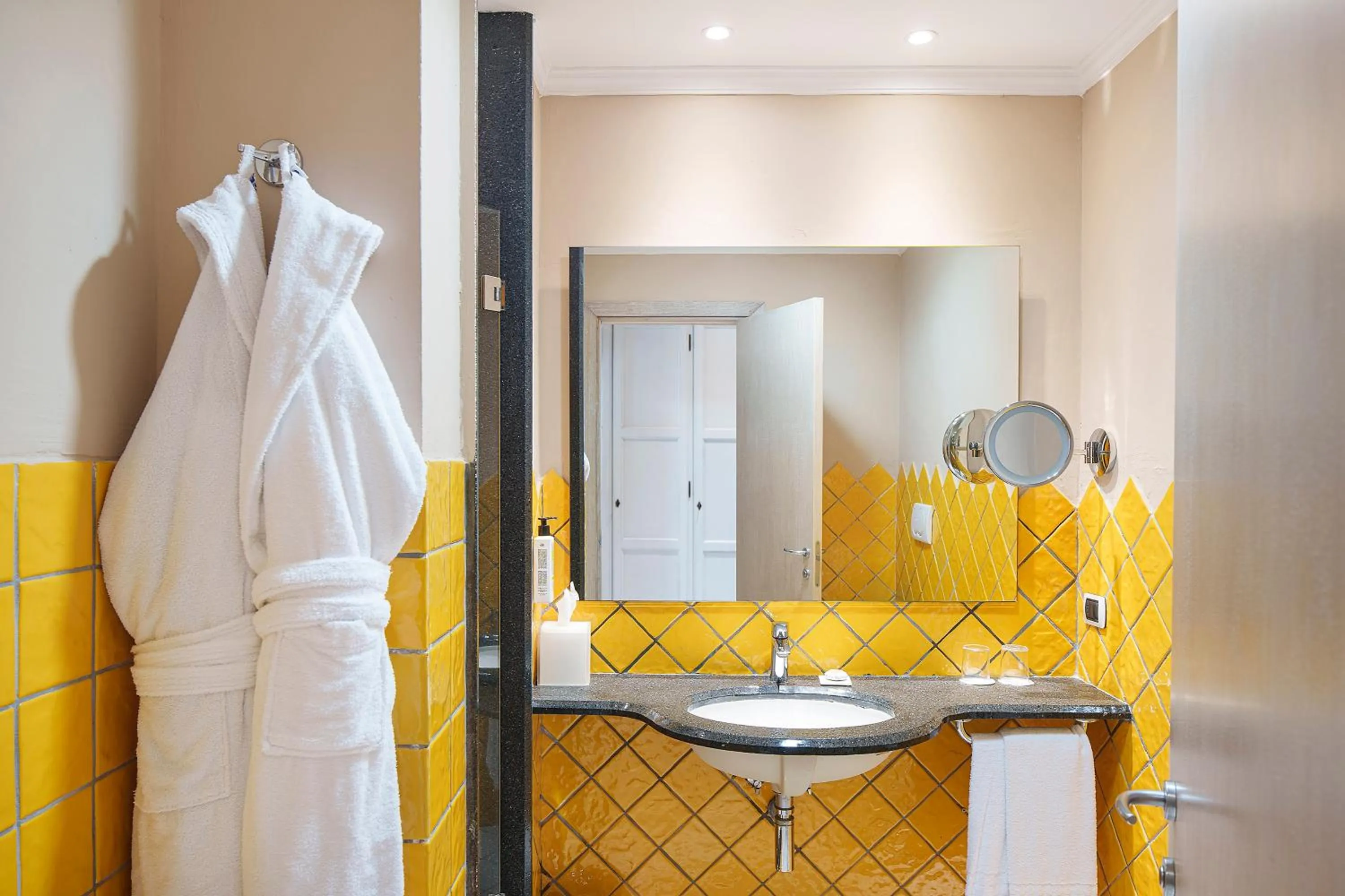 Bathroom in Therasia Resort Sea and SPA - The Leading Hotels of the World