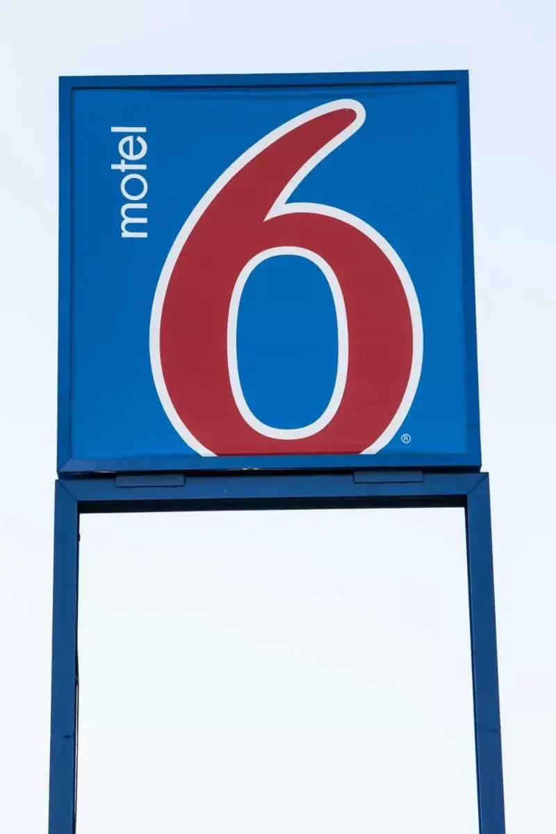 Property logo or sign in Motel 6-Brinkley, AR