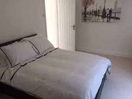 Bed in The Corbyn Apartments