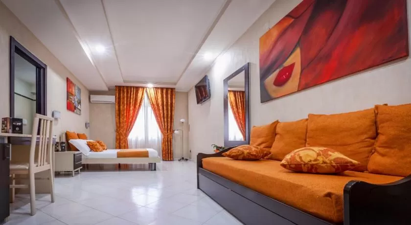 Seating area, Bed in Hotel Daytona Palace