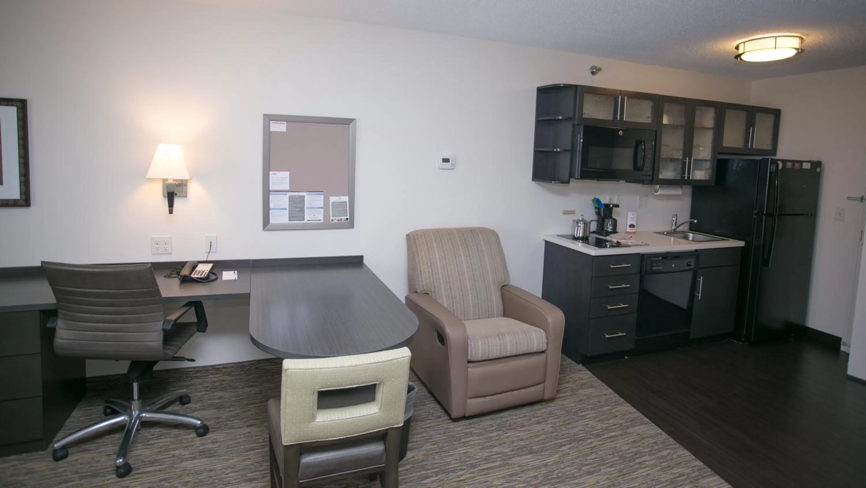 Photo of the whole room in Candlewood Suites Fargo-North Dakota State University by IHG