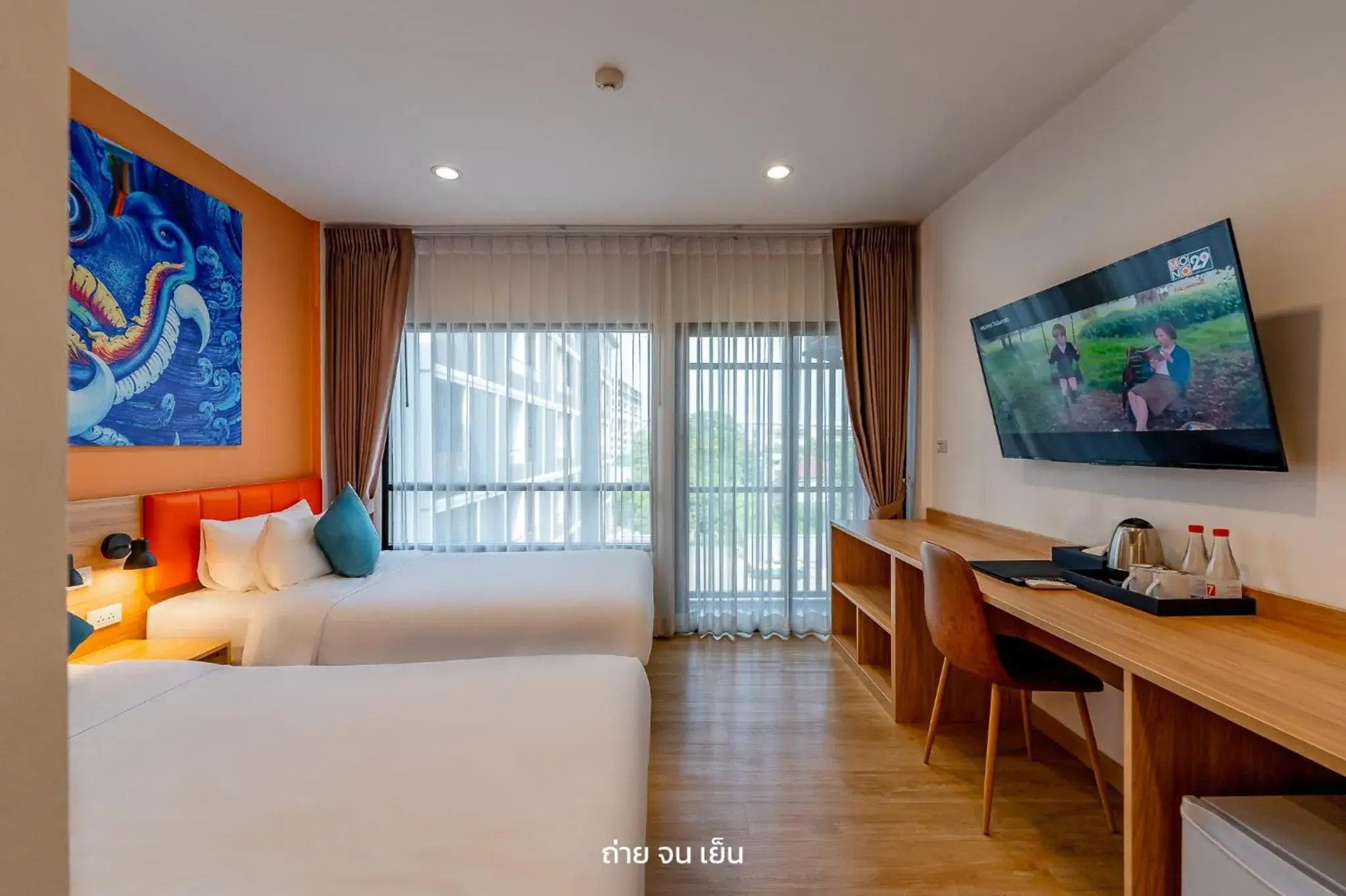 Bed, TV/Entertainment Center in The Iconic Hotel Don Mueang Airport