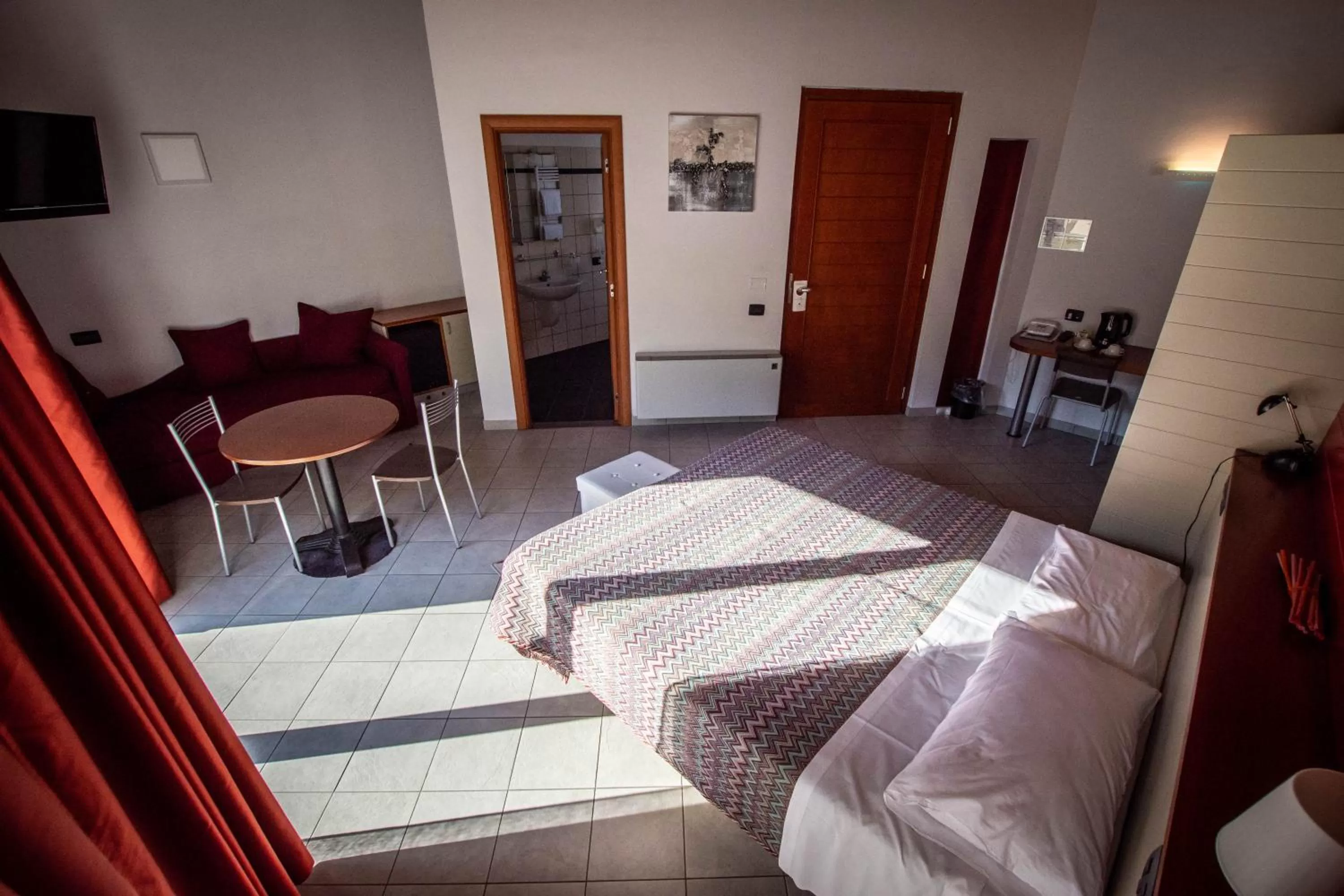 Bed in AgriCamping AlbaVillage Hotel & Wellness