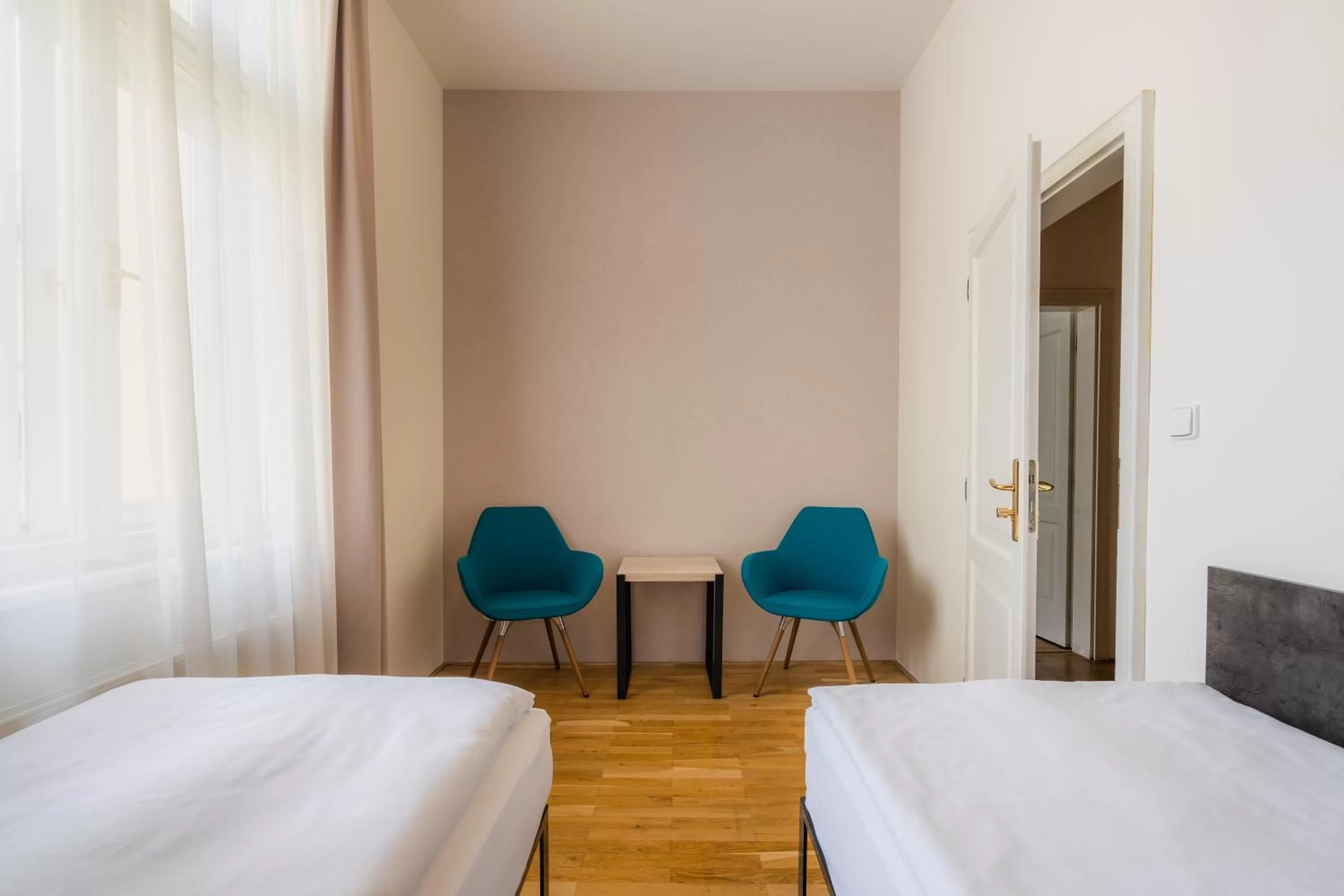 Seating area, Bed in EA ApartHotel Melantrich