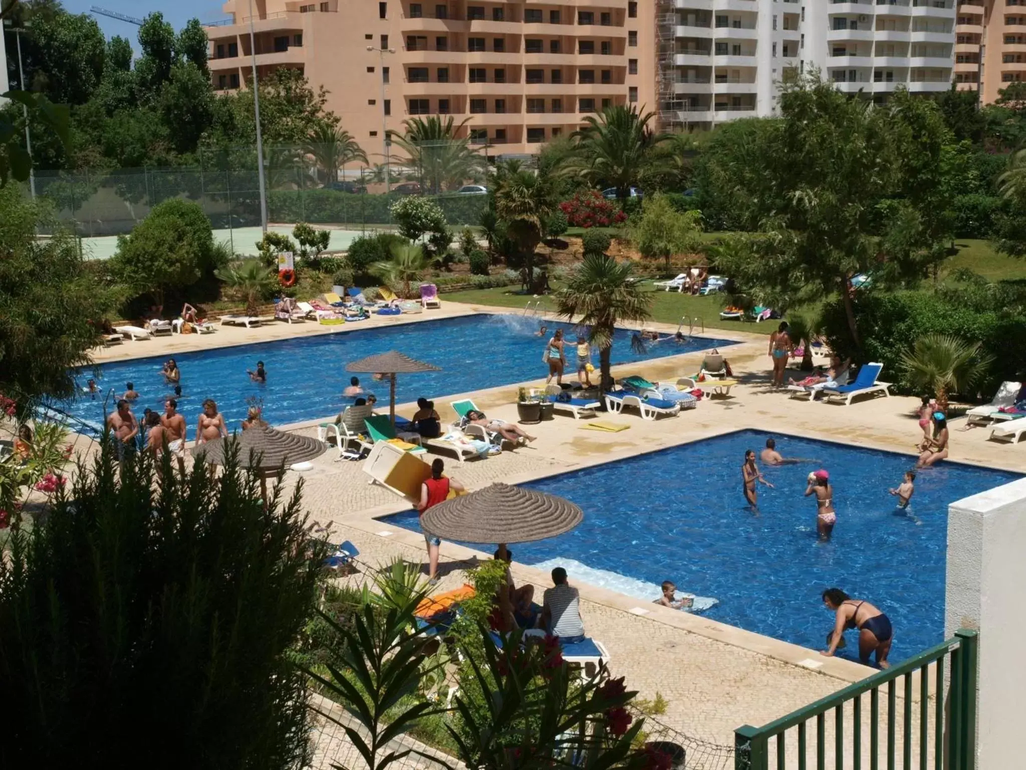 People, Pool View in Apartamentos Jardins da Rocha