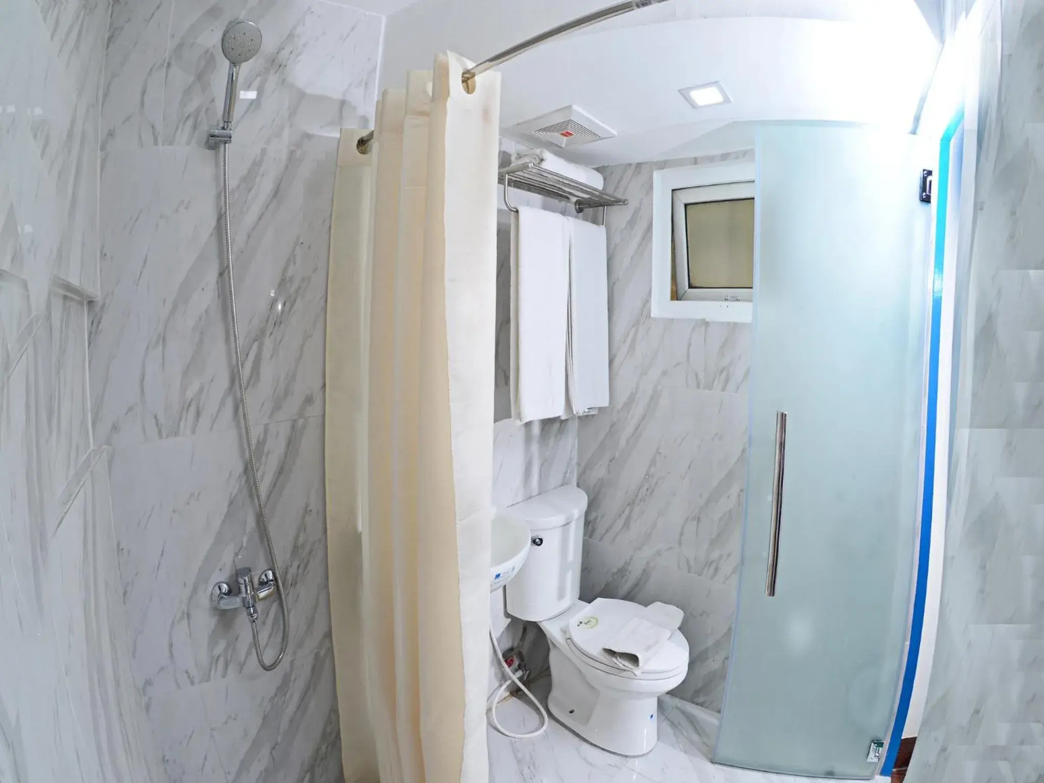 Shower, Bathroom in Skyblue Hotel