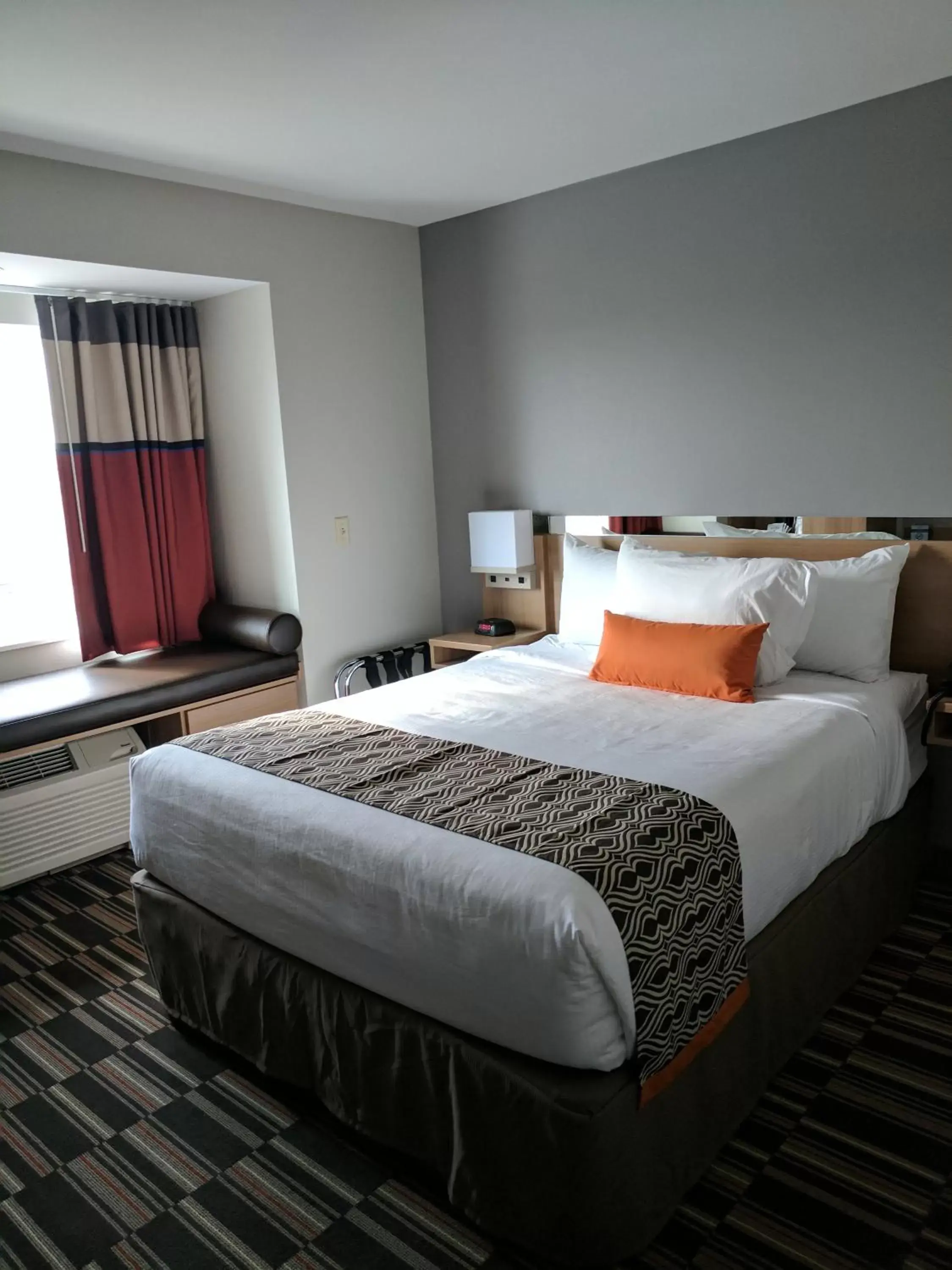 Bed in Microtel Inn & Suites by Wyndham Clarion