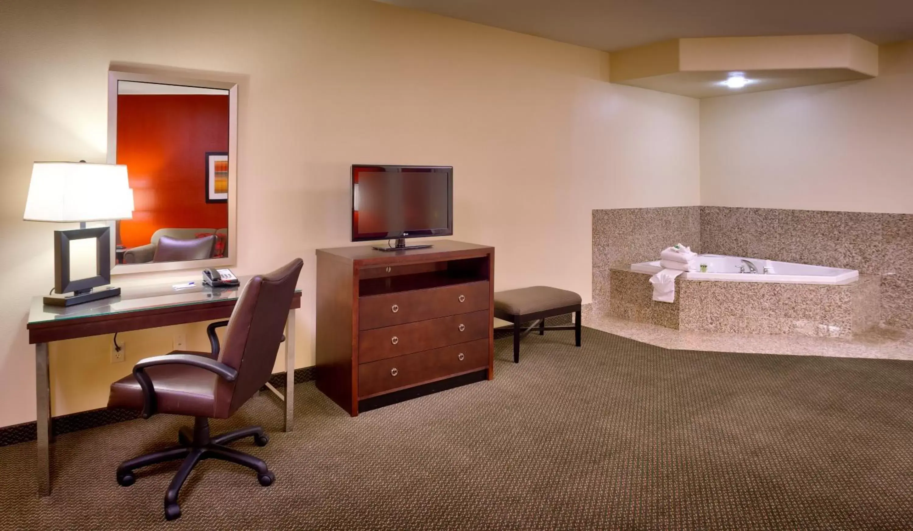 Photo of the whole room, TV/Entertainment Center in Holiday Inn Express & Suites Mesquite Nevada, an IHG Hotel