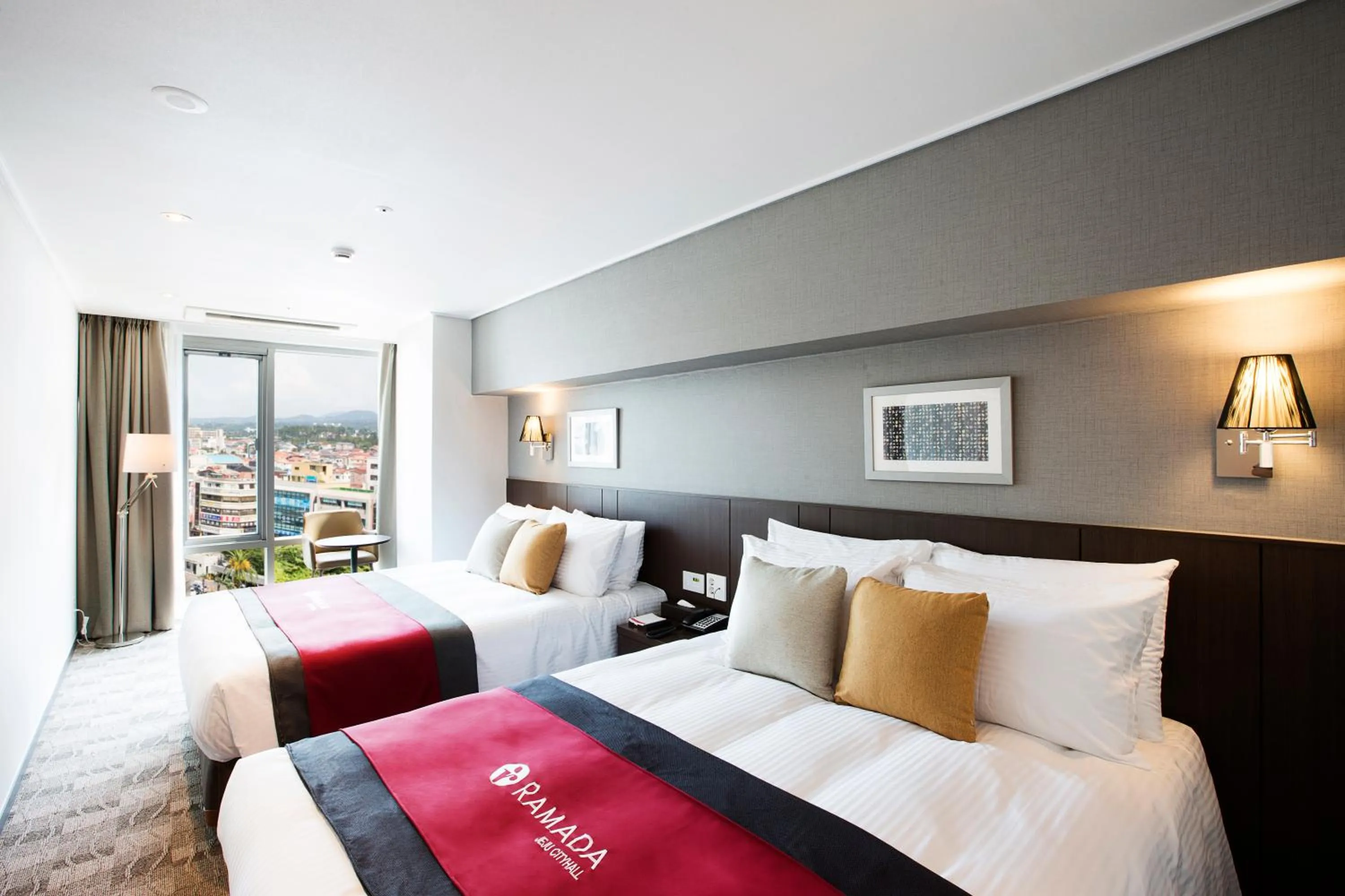 Bed in Ramada by Wyndham Jeju City Hall