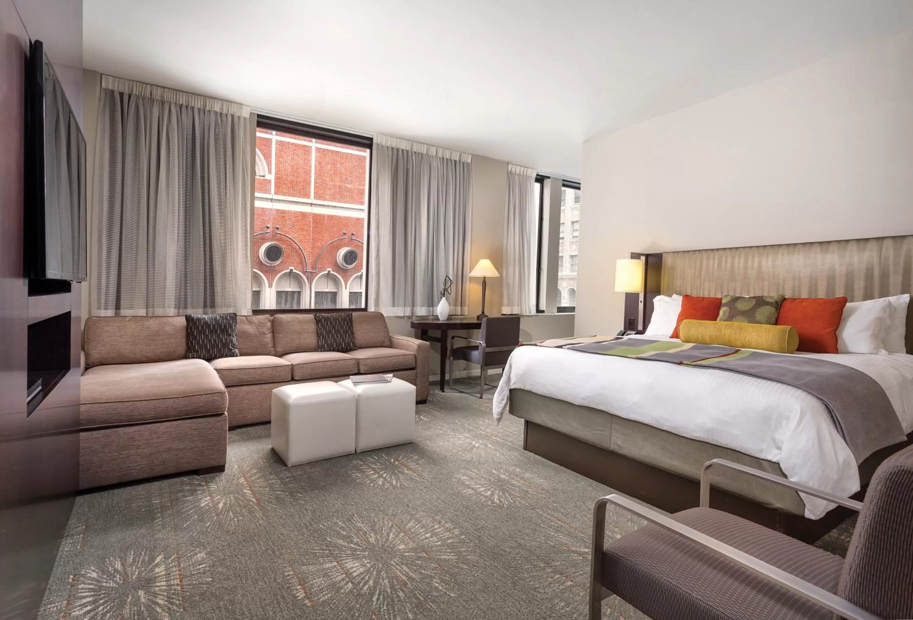 Living room, Bed in The Donatello Hotel