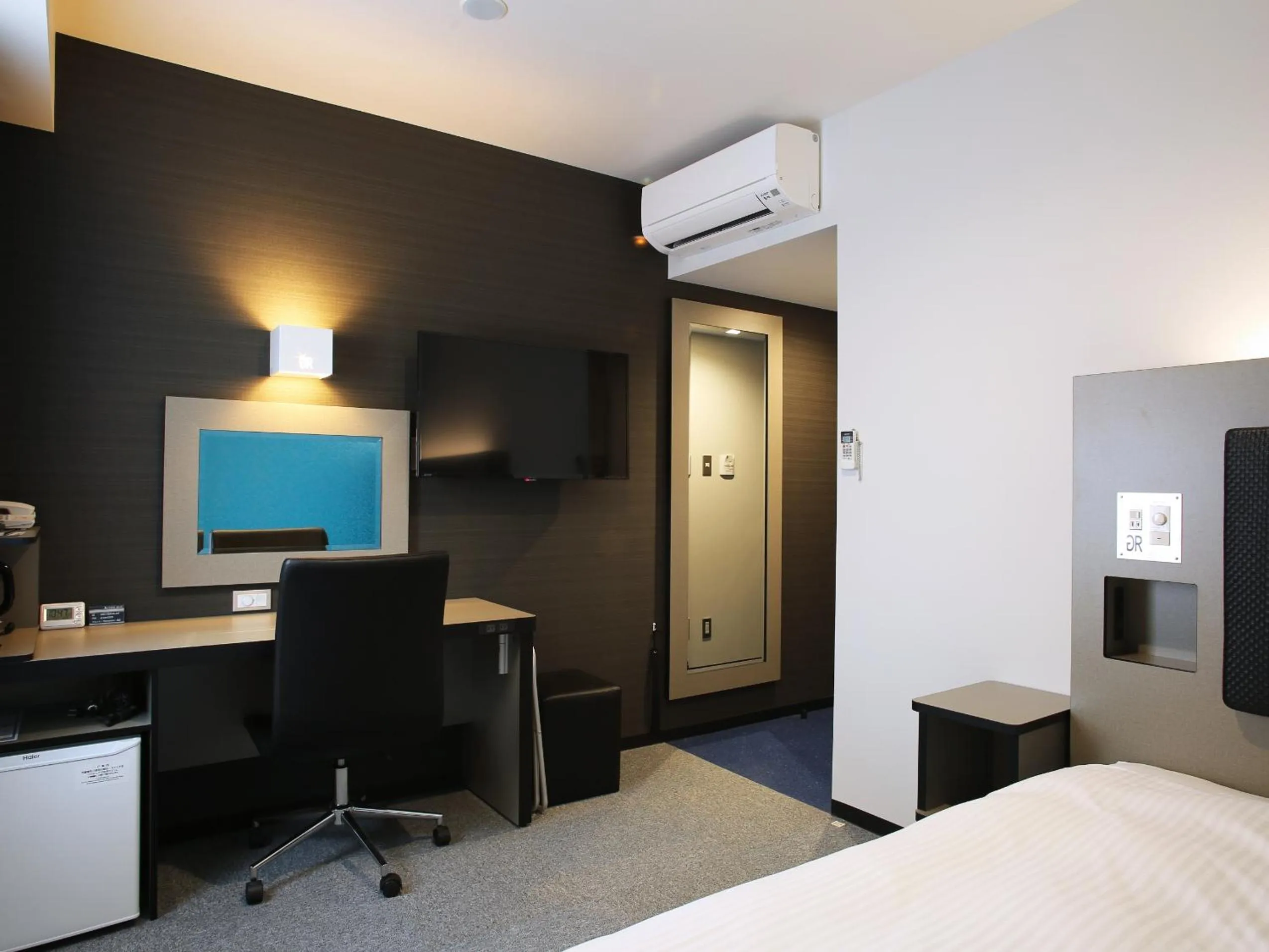 Photo of the whole room, Bed in Green Rich Hotel & Capsule Naha - Artificial hot spring Futamata Yunohana