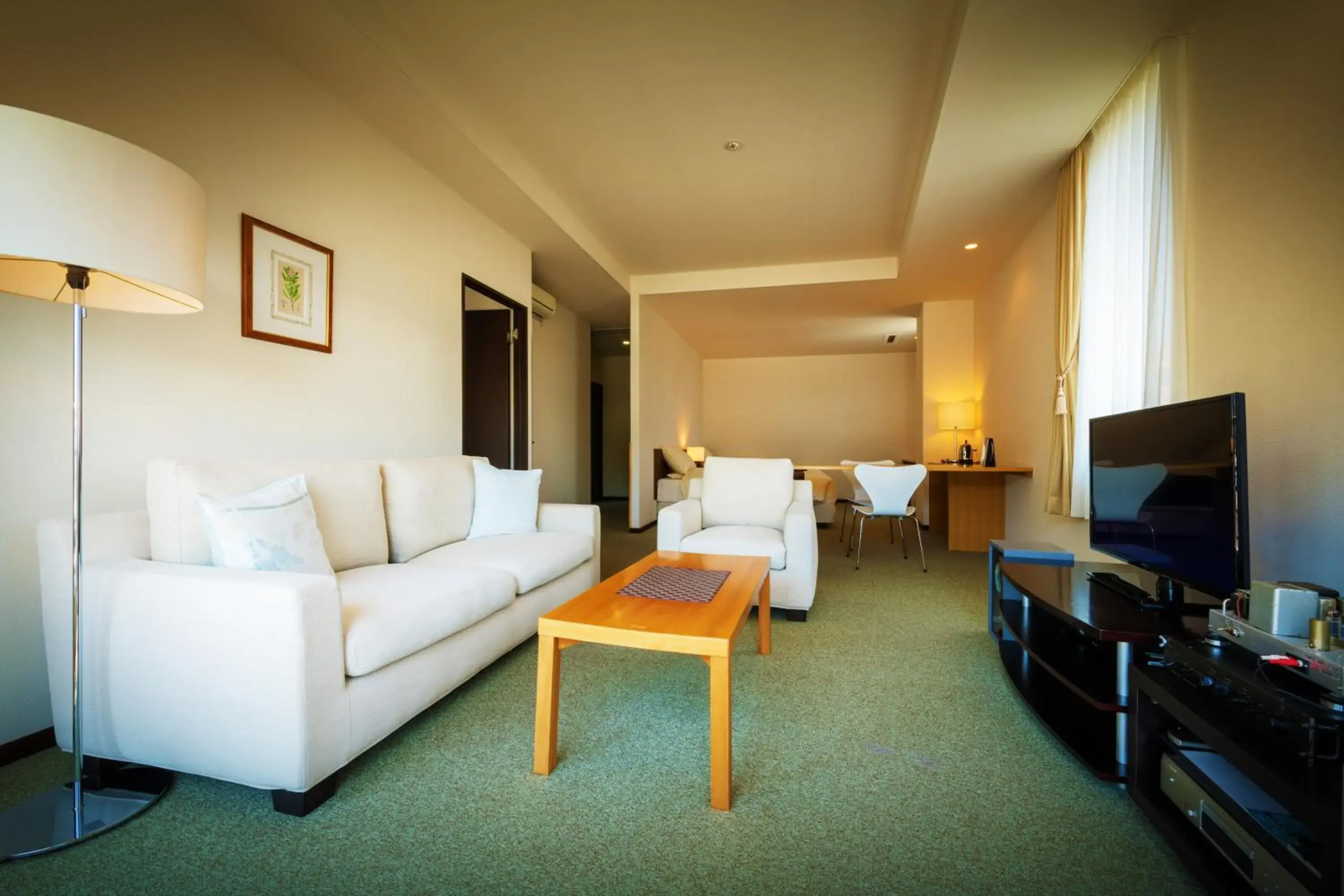 Photo of the whole room, TV/Entertainment Center in Villa Concordia Resort & Spa