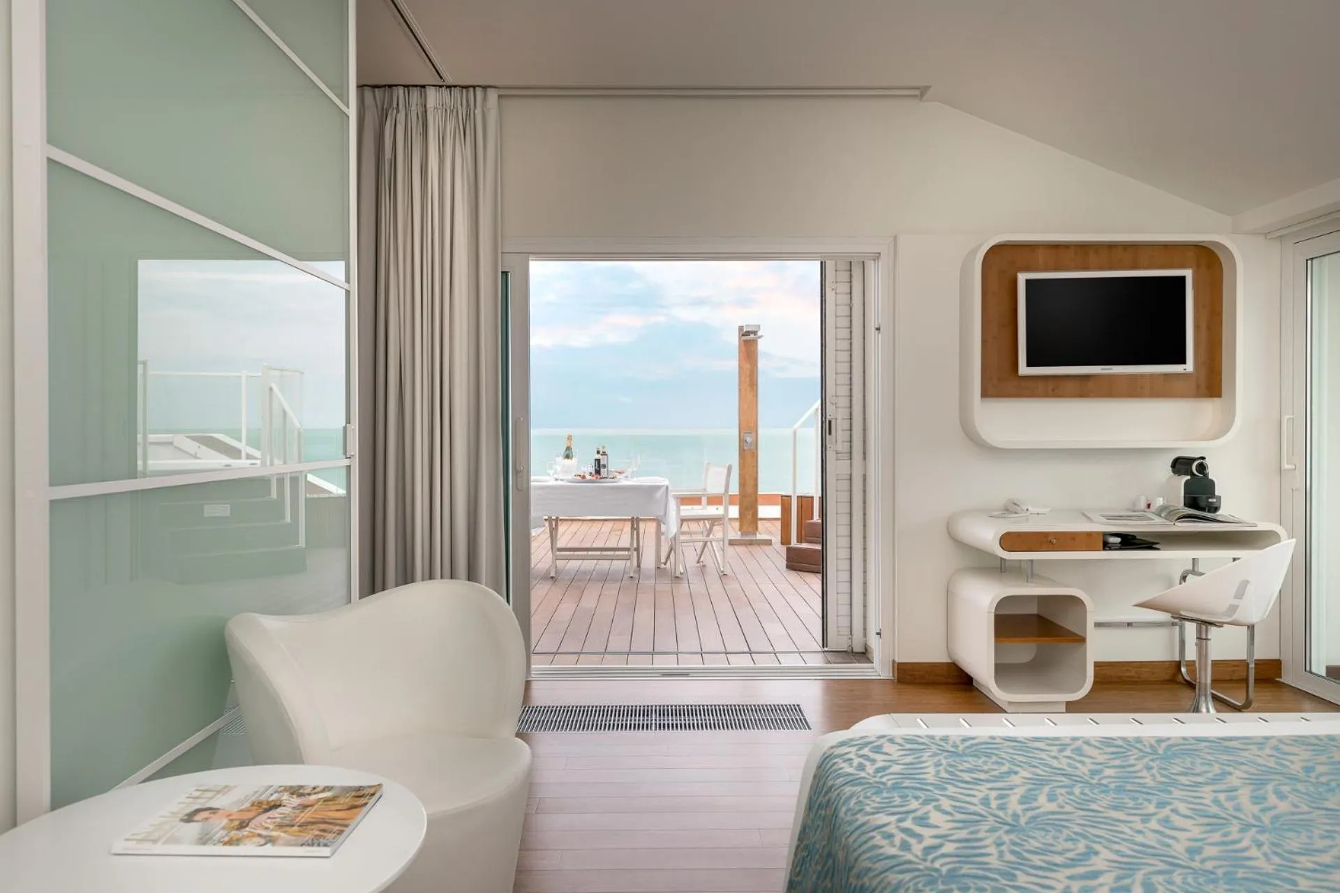 Bed in T-Suite Hotel