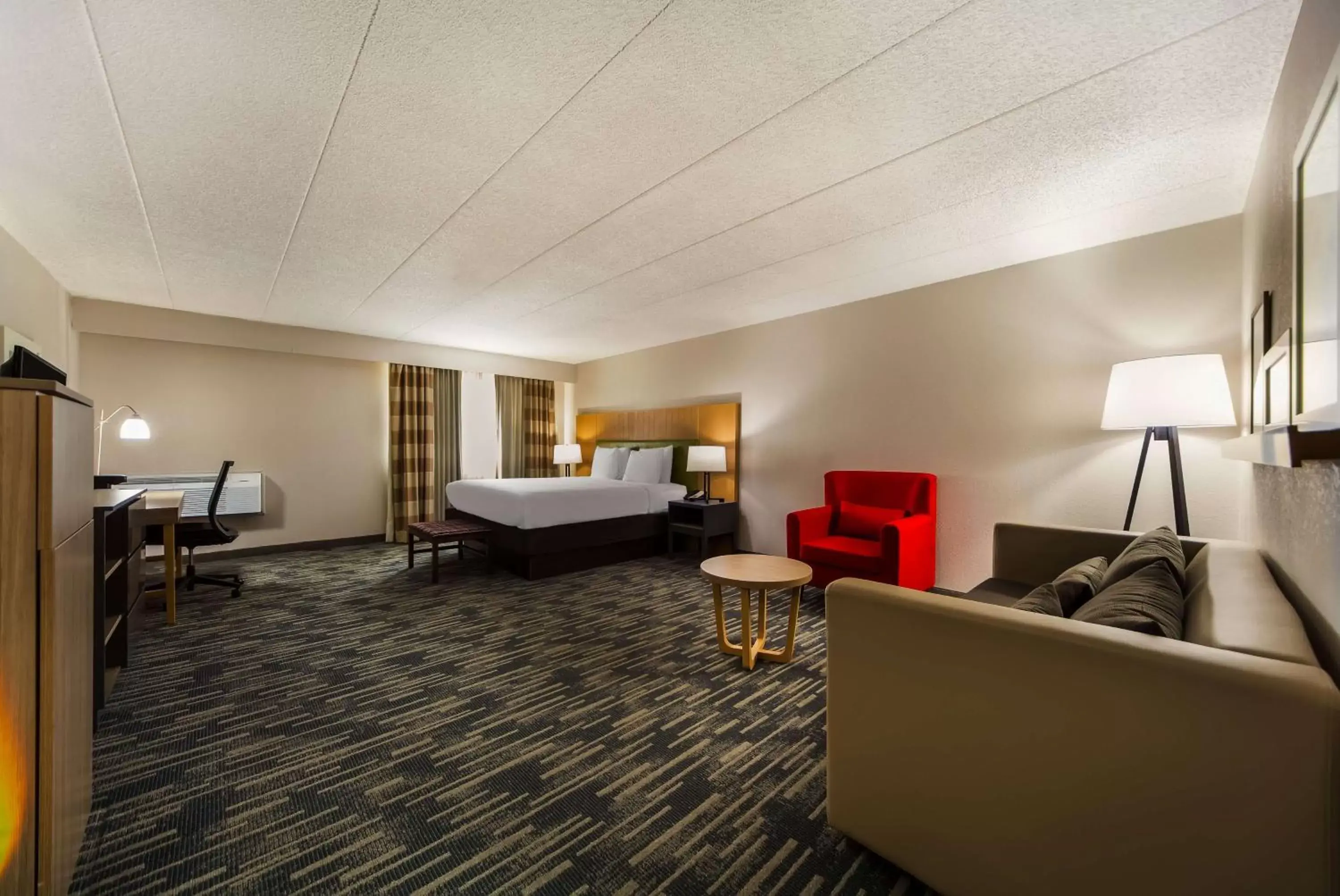 Bedroom, Seating Area in Country Inn & Suites by Radisson, Lincoln Airport, NE