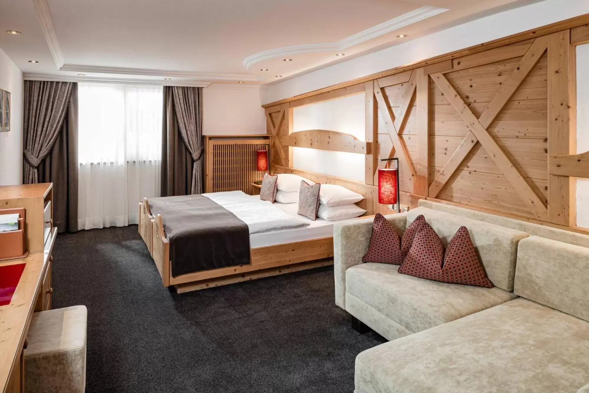 Bed in Hotel Alpenroyal - The Leading Hotels of the World