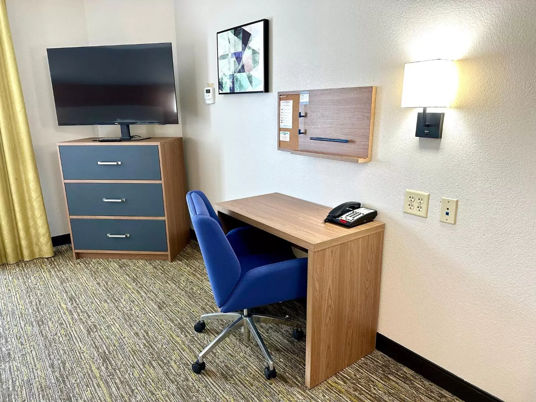 Photo of the whole room, TV/Entertainment Center in Candlewood Suites Savannah Airport, an IHG Hotel