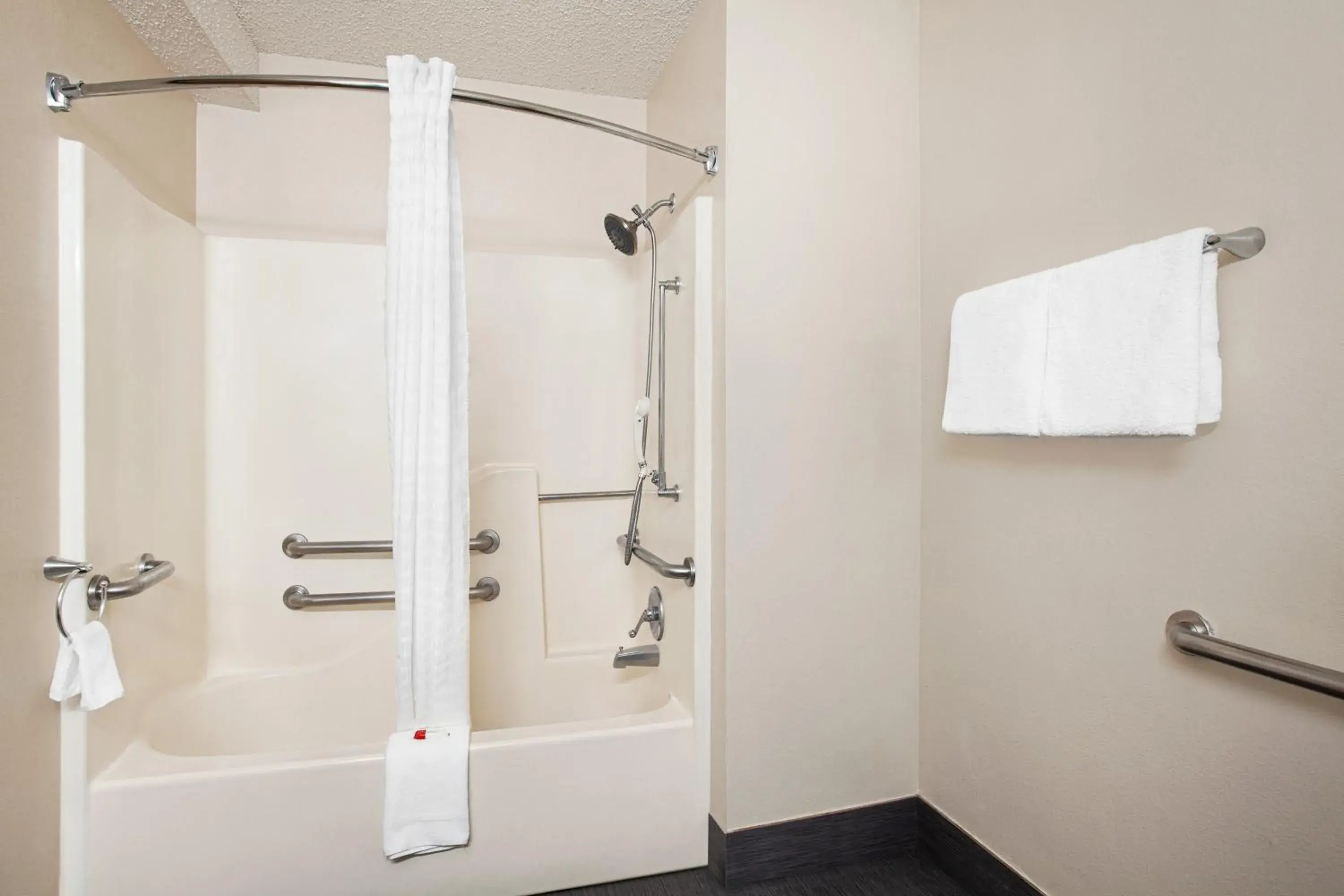 Shower, Bathroom in Days Inn by Wyndham Kansas City International Airport