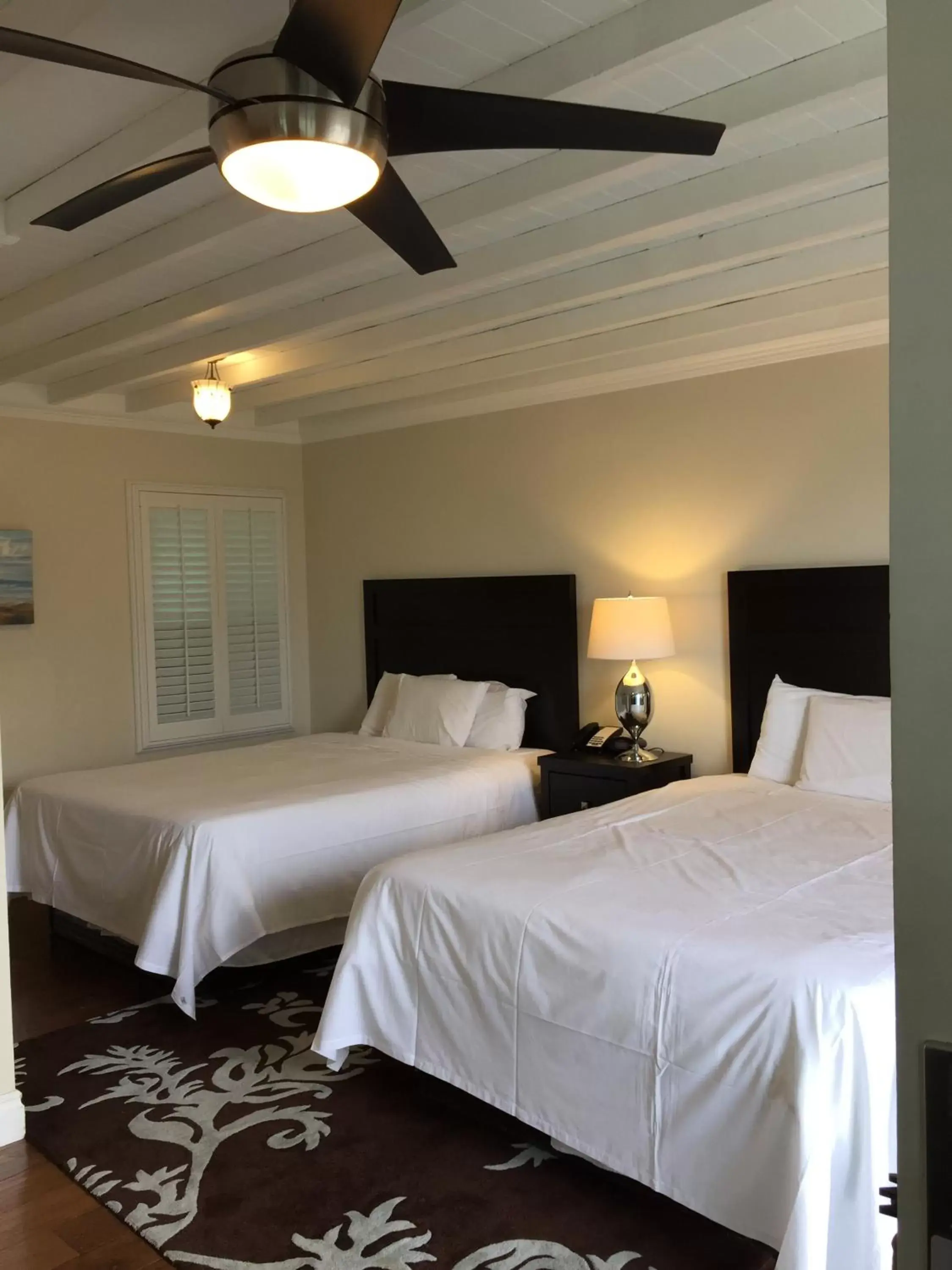 Bedroom, Bed in Beach Bungalow Inn and Suites