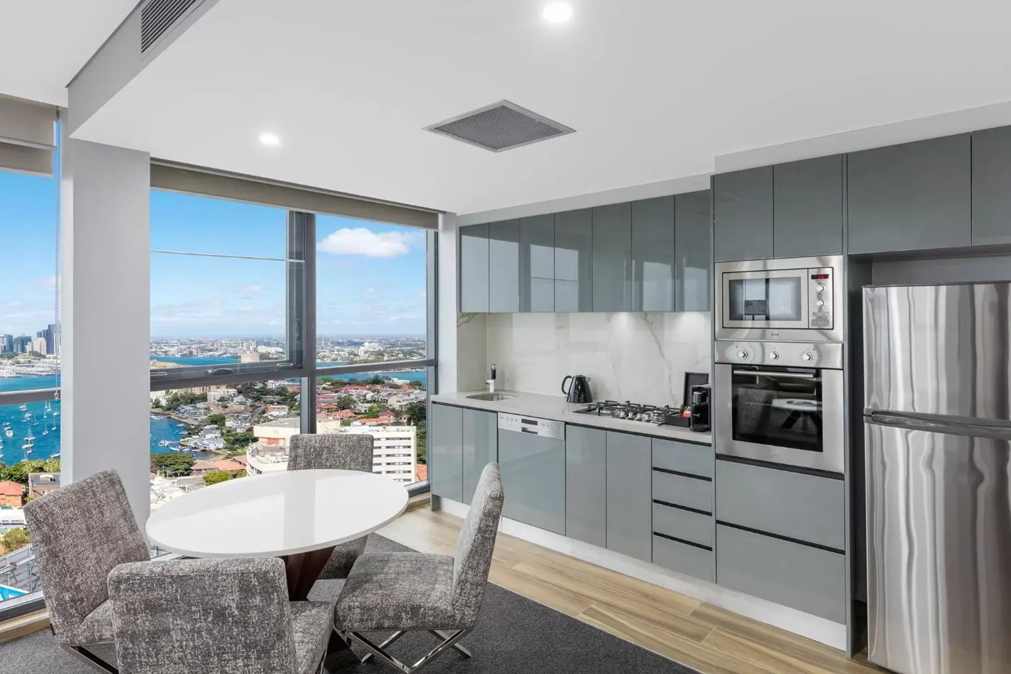 Dining area, Kitchen/Kitchenette in Meriton Suites North Sydney