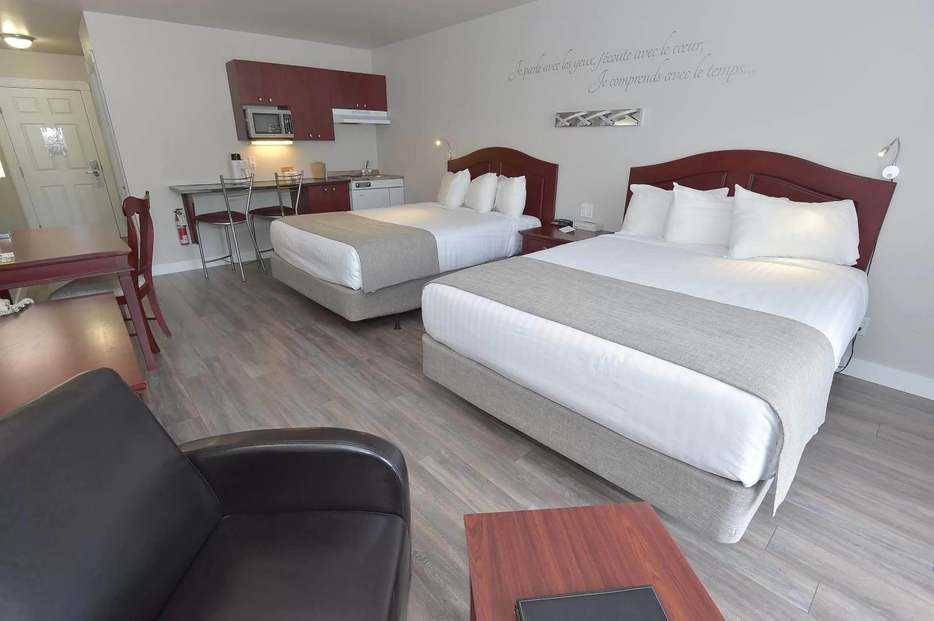 Photo of the whole room, Bed in Hôtel et Pavillons Le Petit Manoir du Casino