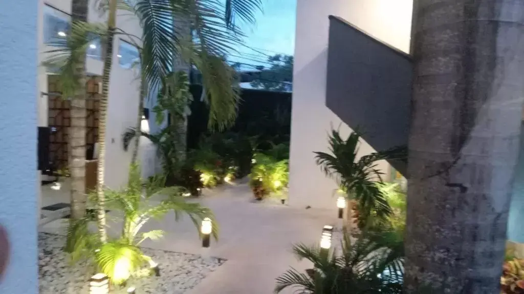 Garden view, Property Building in Seven Boutique Apartments Cancún