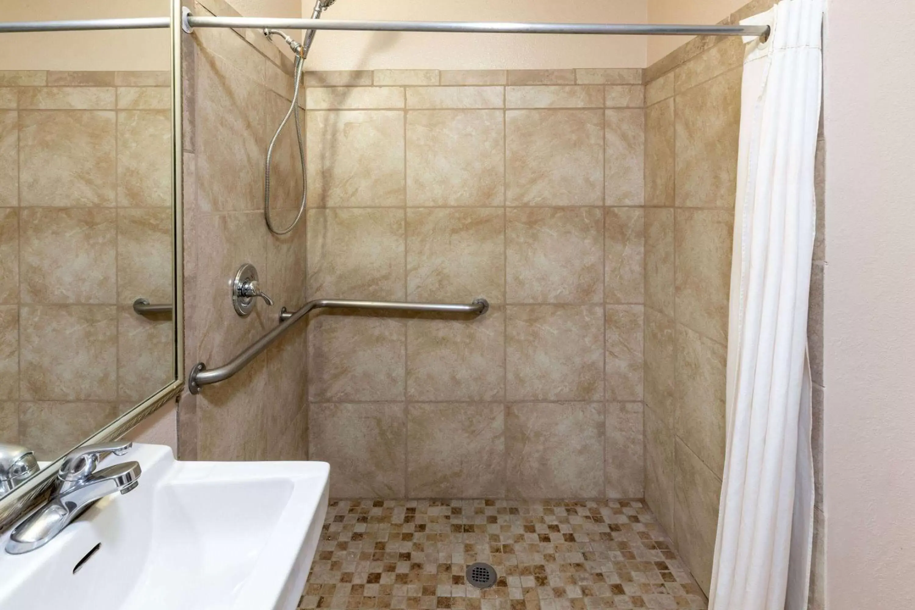 Shower, Bathroom in Super 8 by Wyndham Garland/Rowlett/East Dallas area