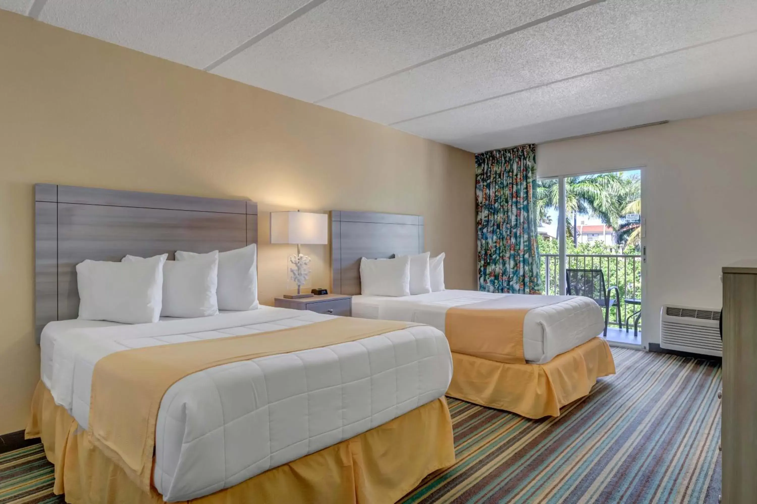 Bed in Hutchinson Island Plaza Hotel & Suites