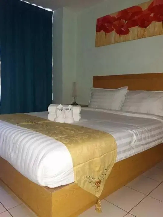 Bed in Fratini's Hotel Labuan