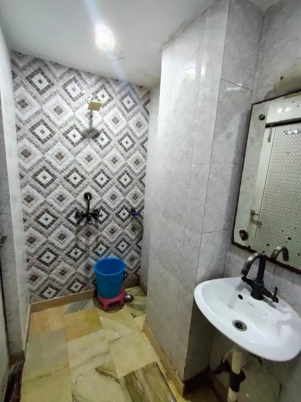Bathroom in Hotel Laxman Resort by The Golden Taj Group &Hotels