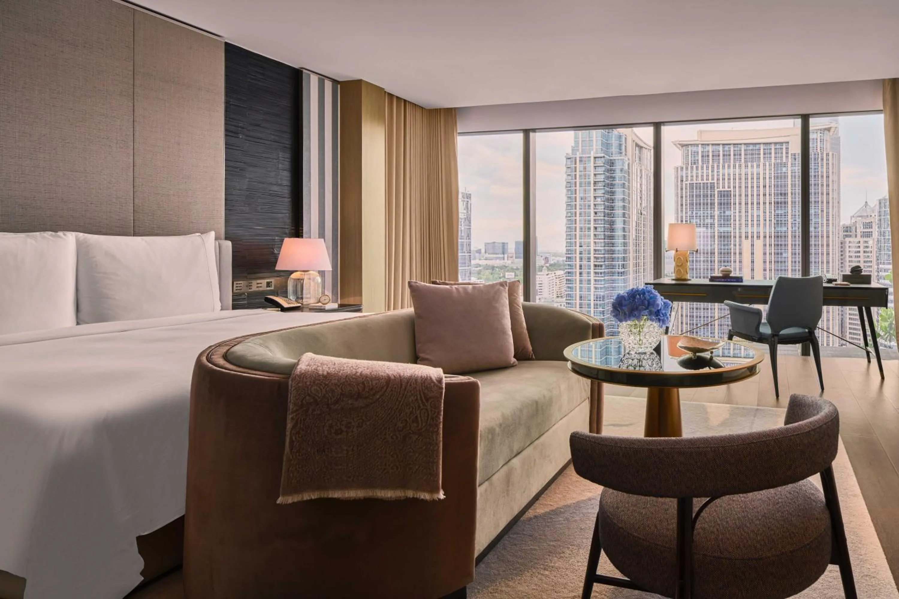 Seating area, Bed in Rosewood Bangkok