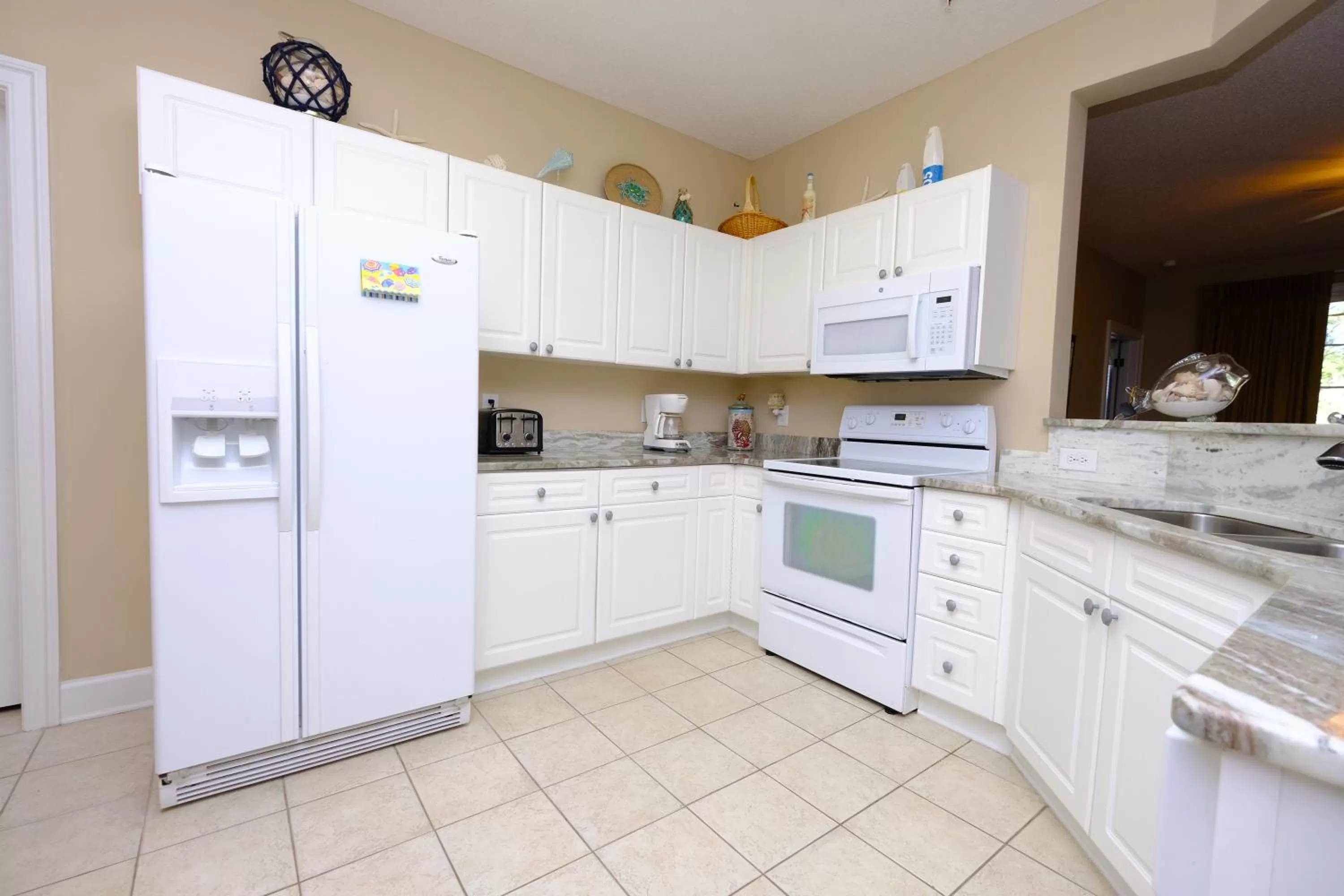 Kitchen or kitchenette in Barefoot Resort Golf & Yacht Club Villas