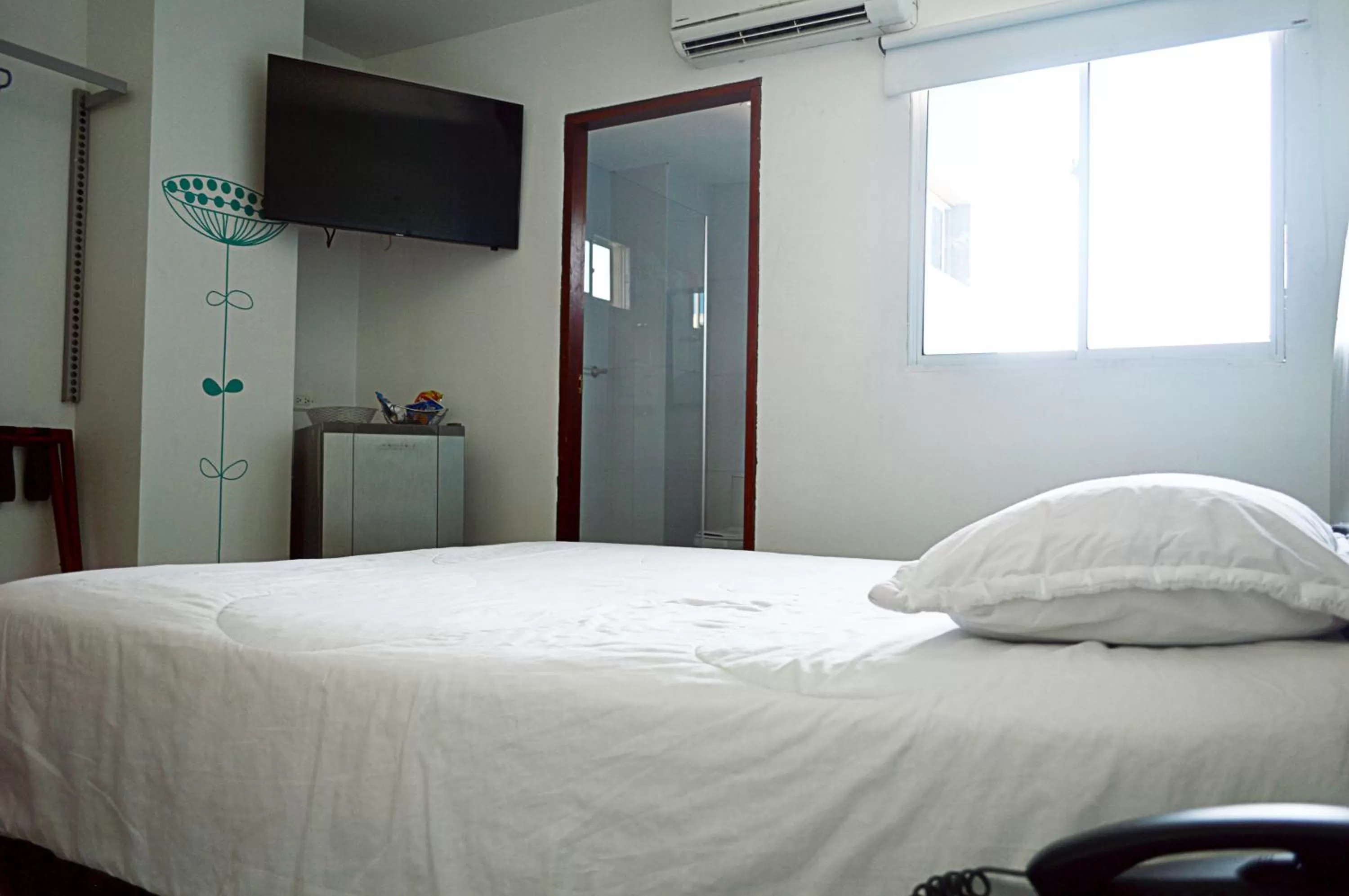 Bed in Hotel Intersuites