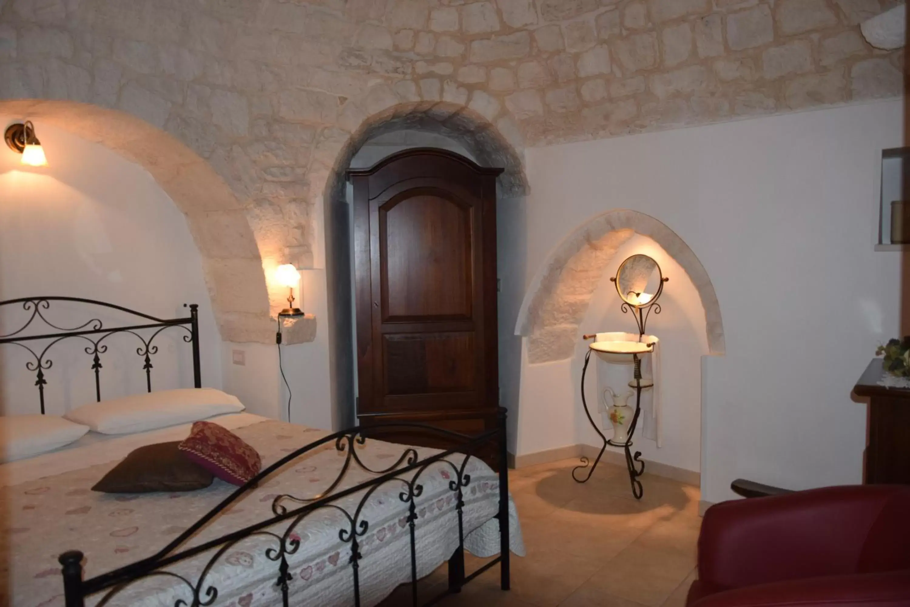 Photo of the whole room, Bed in Quei Trulli Divini
