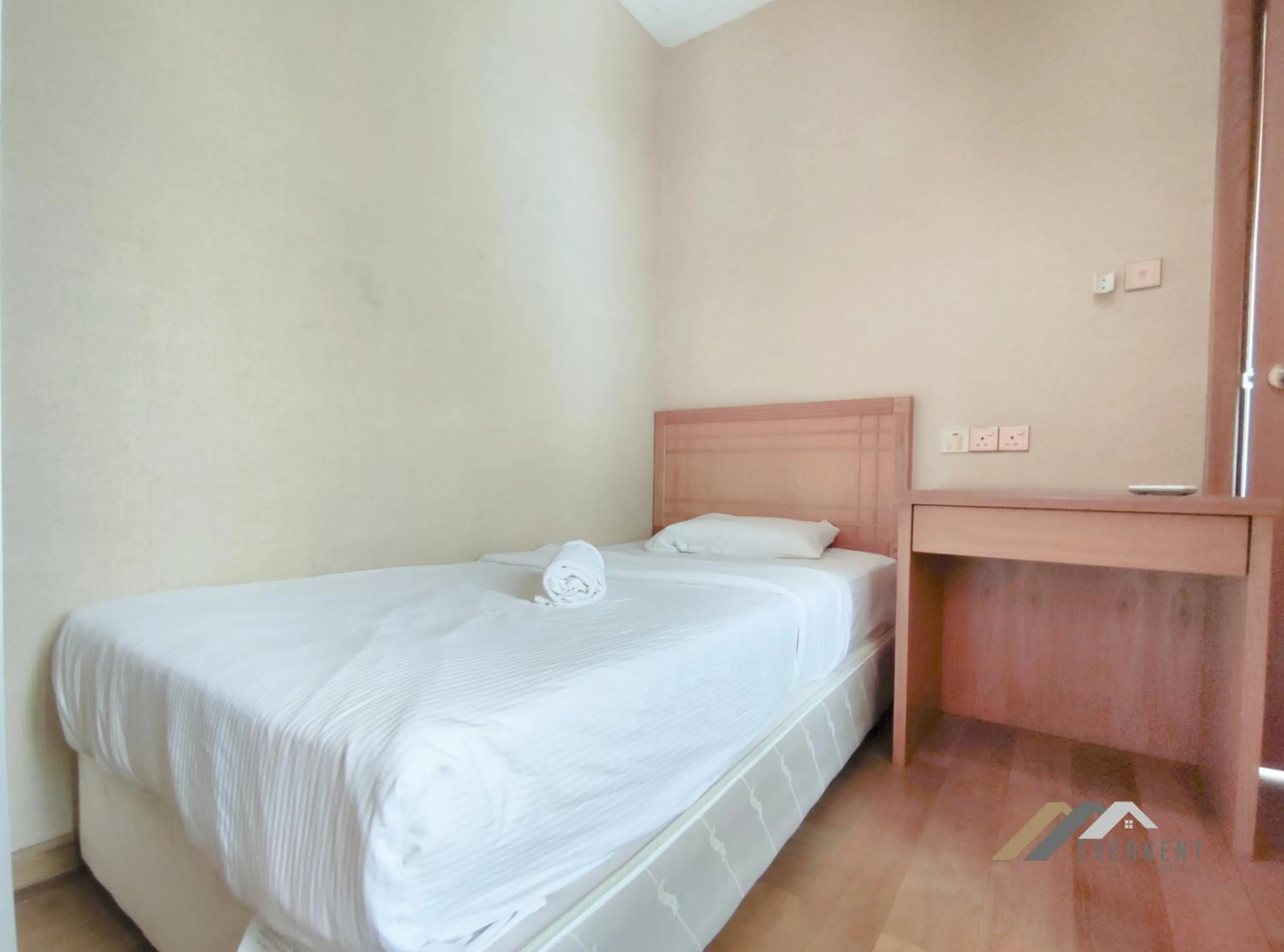 Bed in Mciti Suites by Evernent