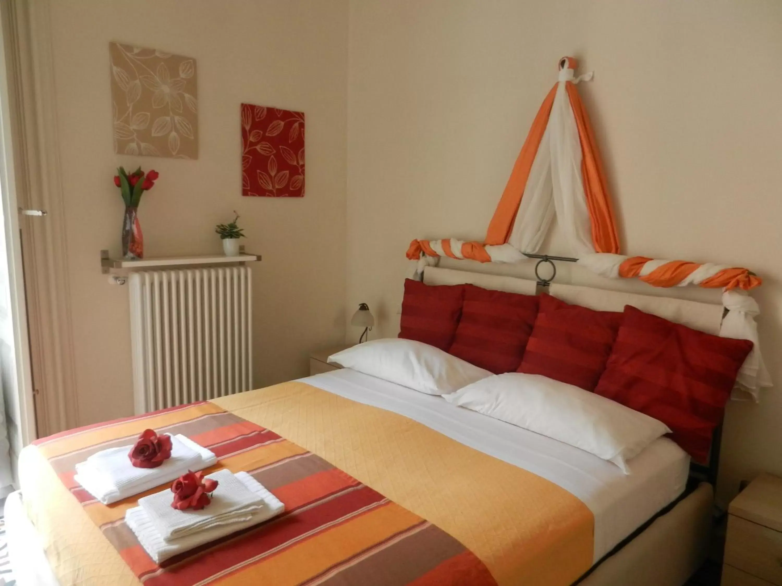 Bed in RossoCorallo B&B