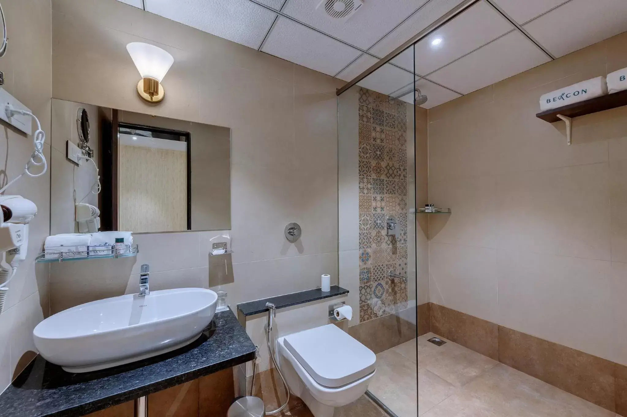 Shower, Bathroom in Guruprerna Beacon Resort, Dwarka