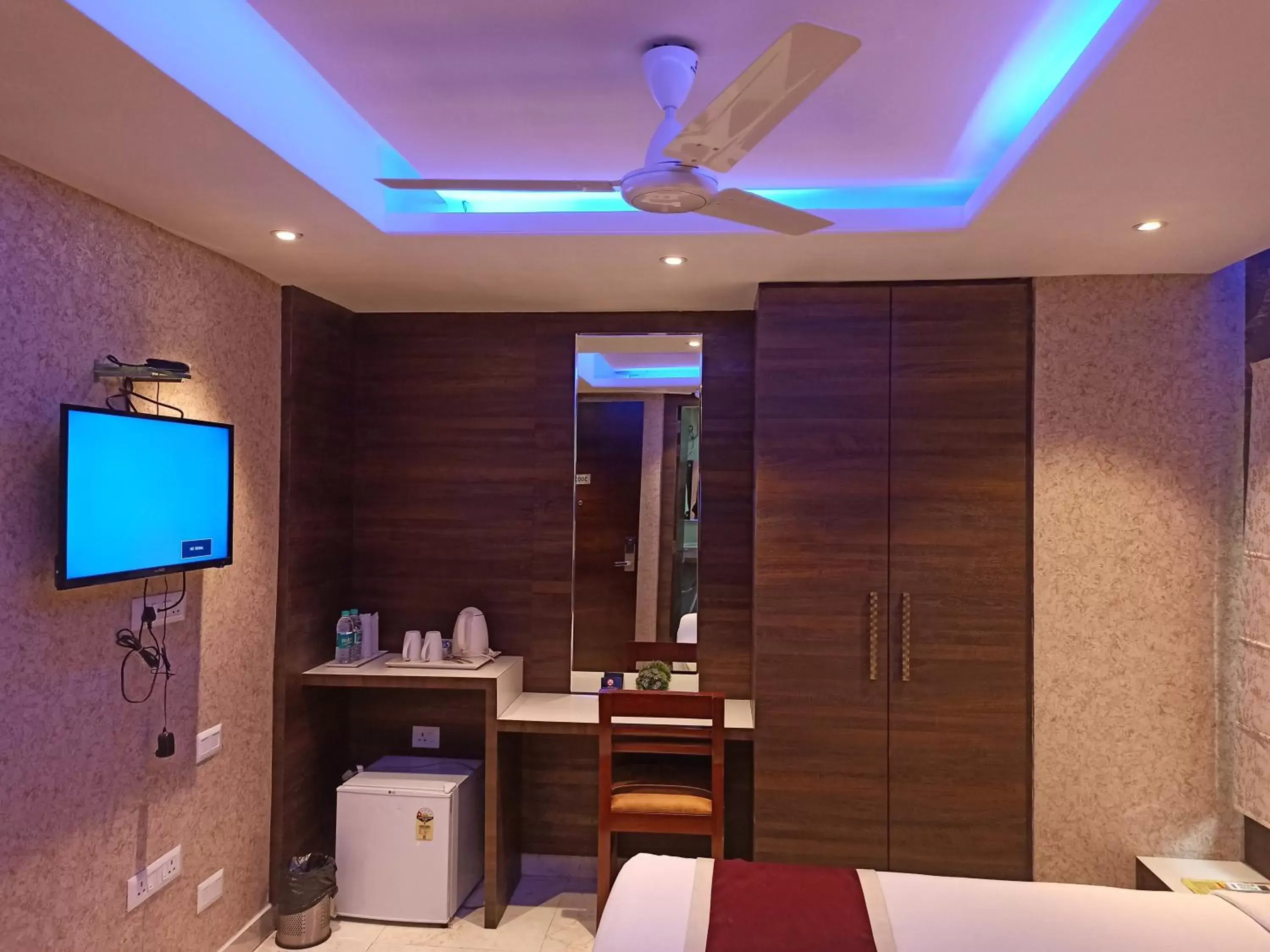 Communal lounge/ TV room, Bed in Hotel A P Home's - A Boutique Hotel Communal lounge/ TV room, Bed in Hotel A P Home's - A Boutique Hotel