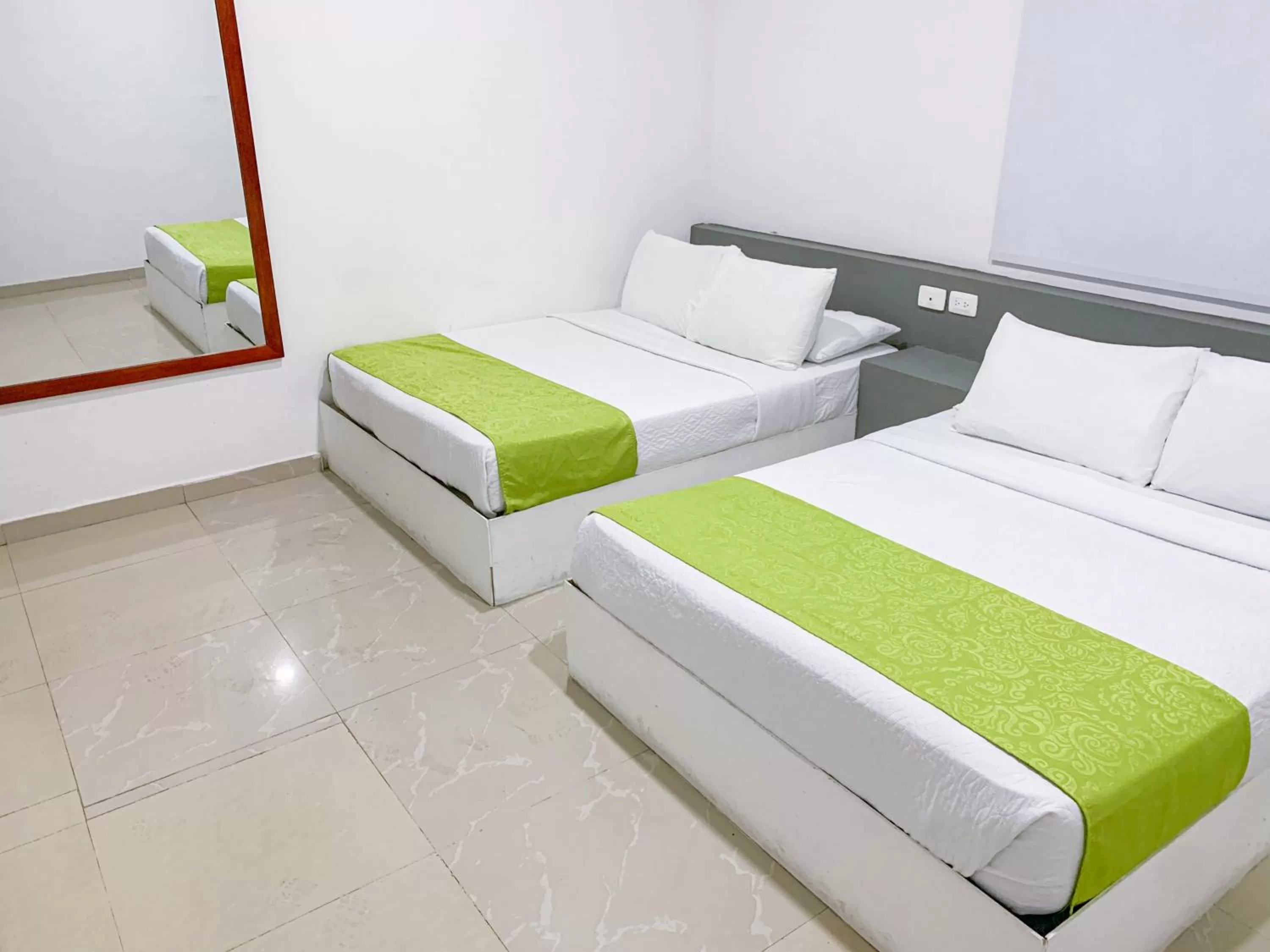Bed in Hotel Abi Inn By GEH Suites