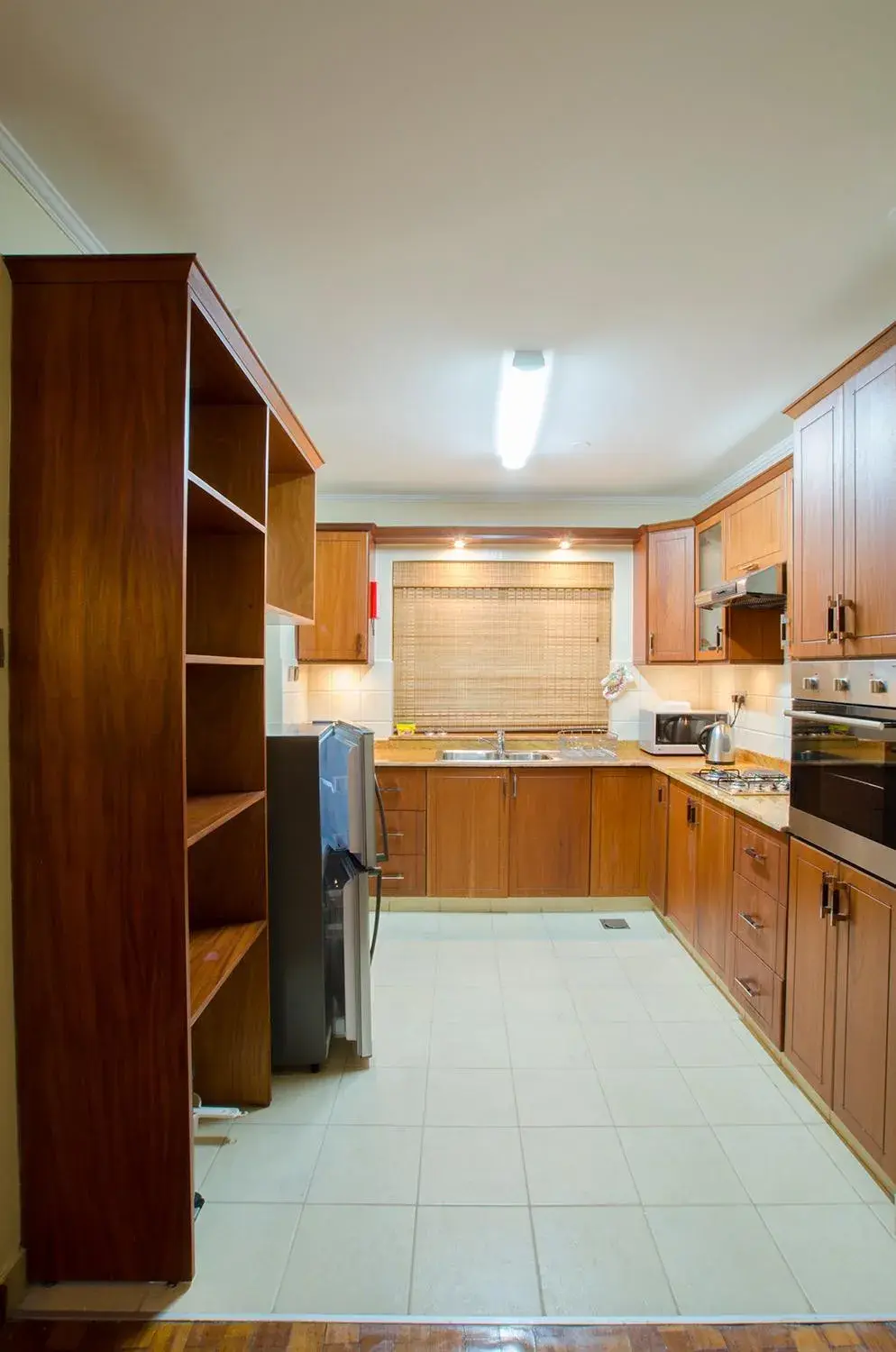 Kitchen or kitchenette, Kitchen/Kitchenette in Waridi Paradise Hotel and Suites