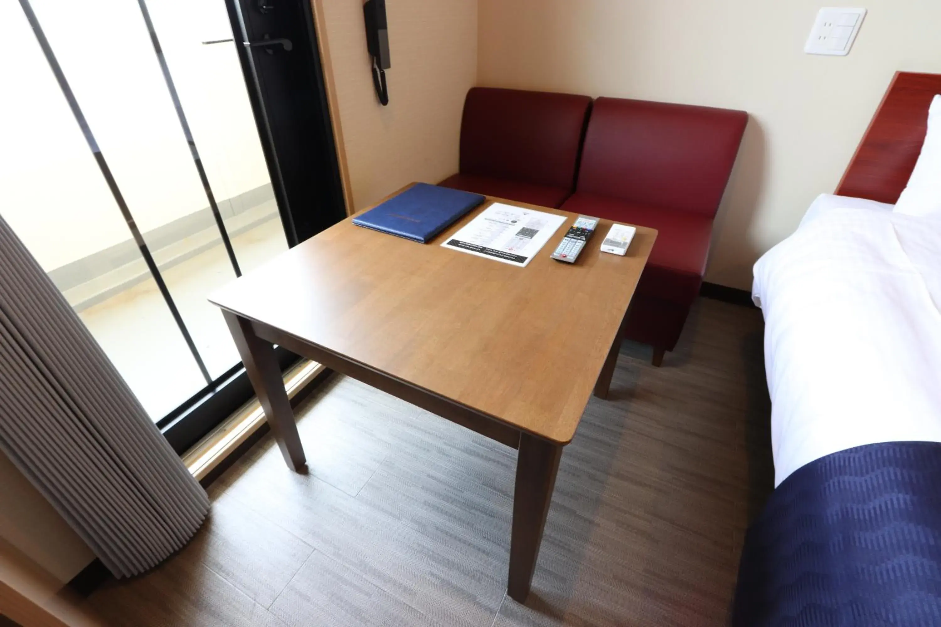 Living room, Bed in Hotel Kanade Kanku Kaizuka Living room, Bed in Hotel Kanade Kanku Kaizuka