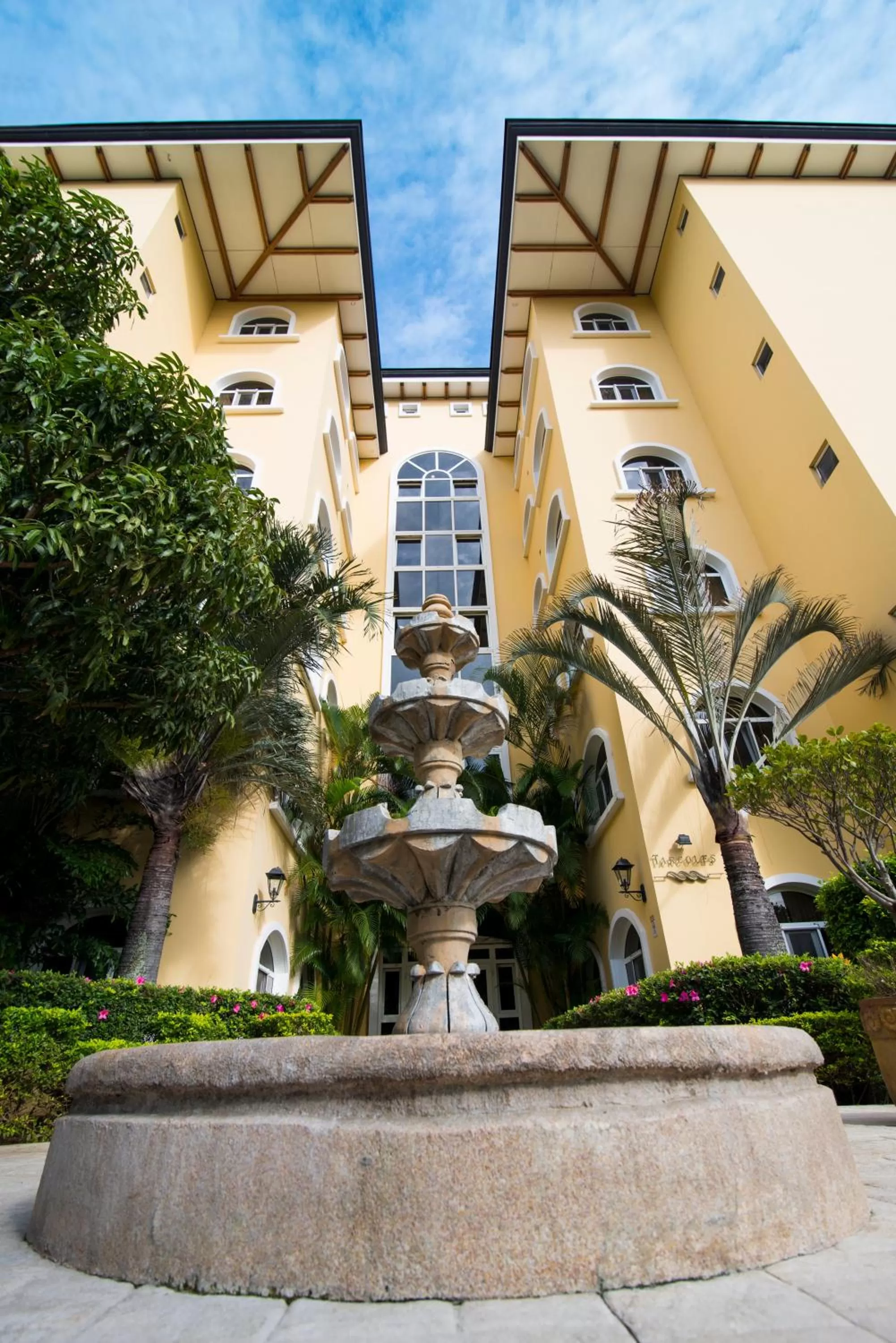 Property building in Apartotel & Suites Villas del Rio