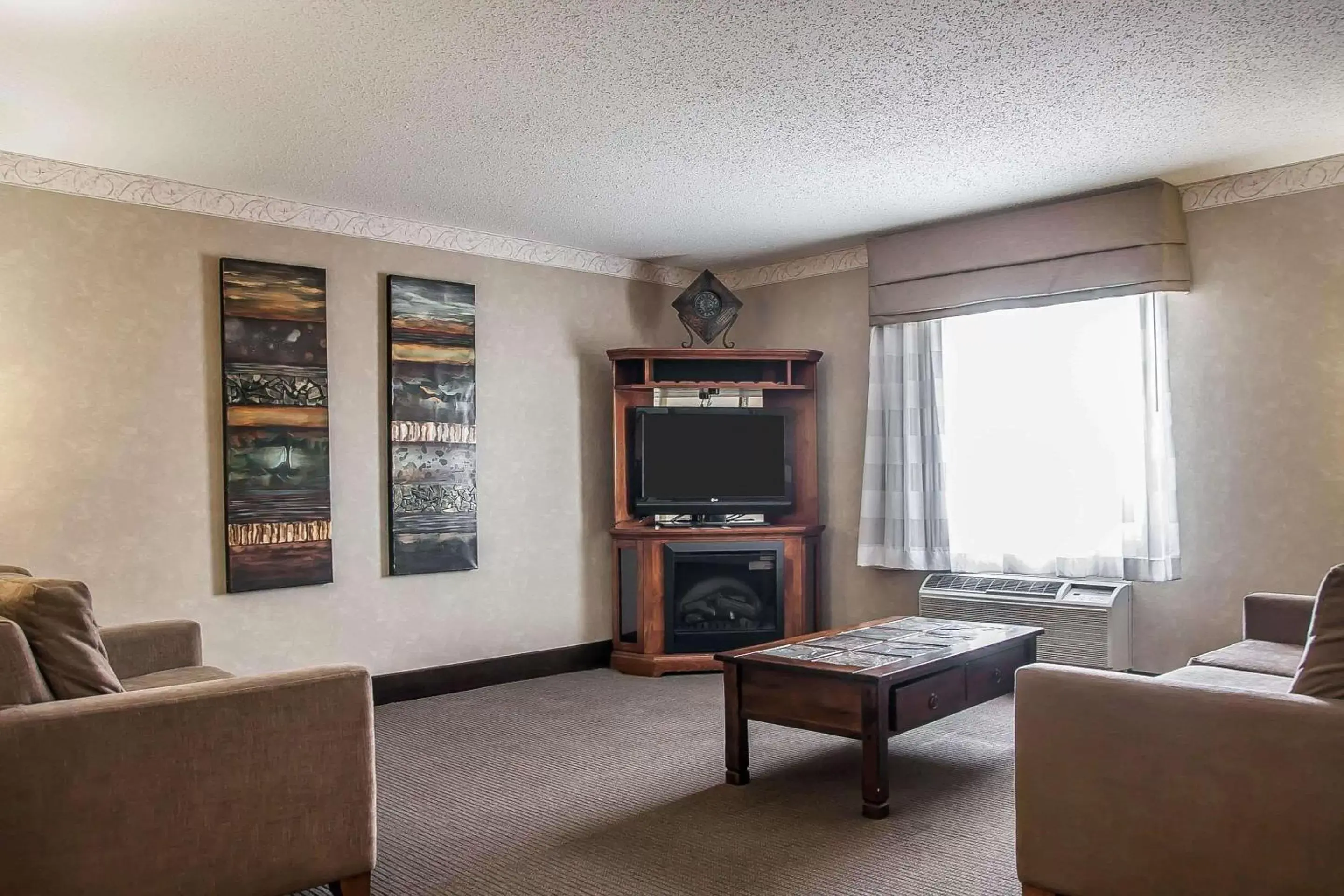 Photo of the whole room, Seating Area in Sleep Inn & Suites Conference Center and Water Park