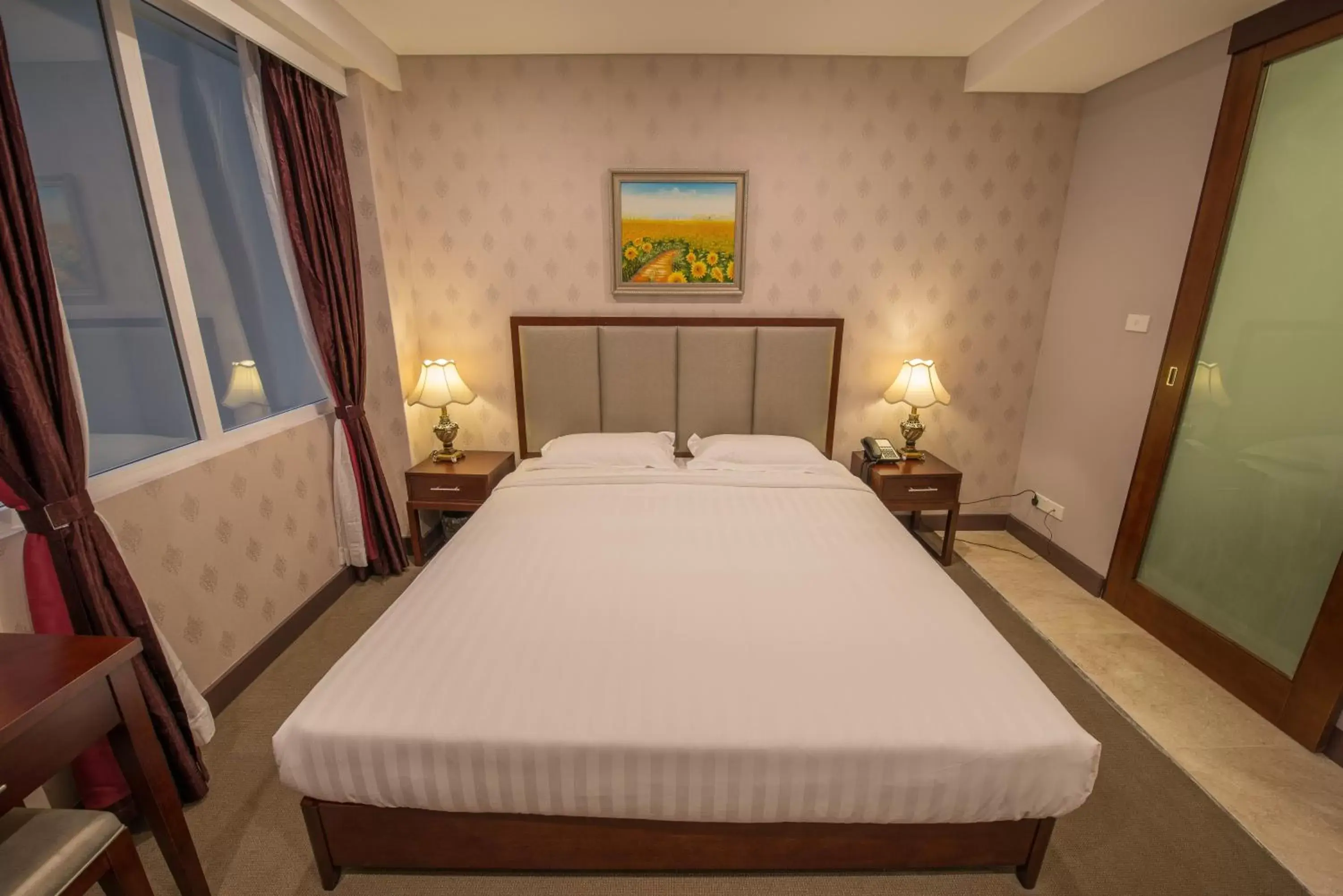 Bed in Megaboom City Hotel