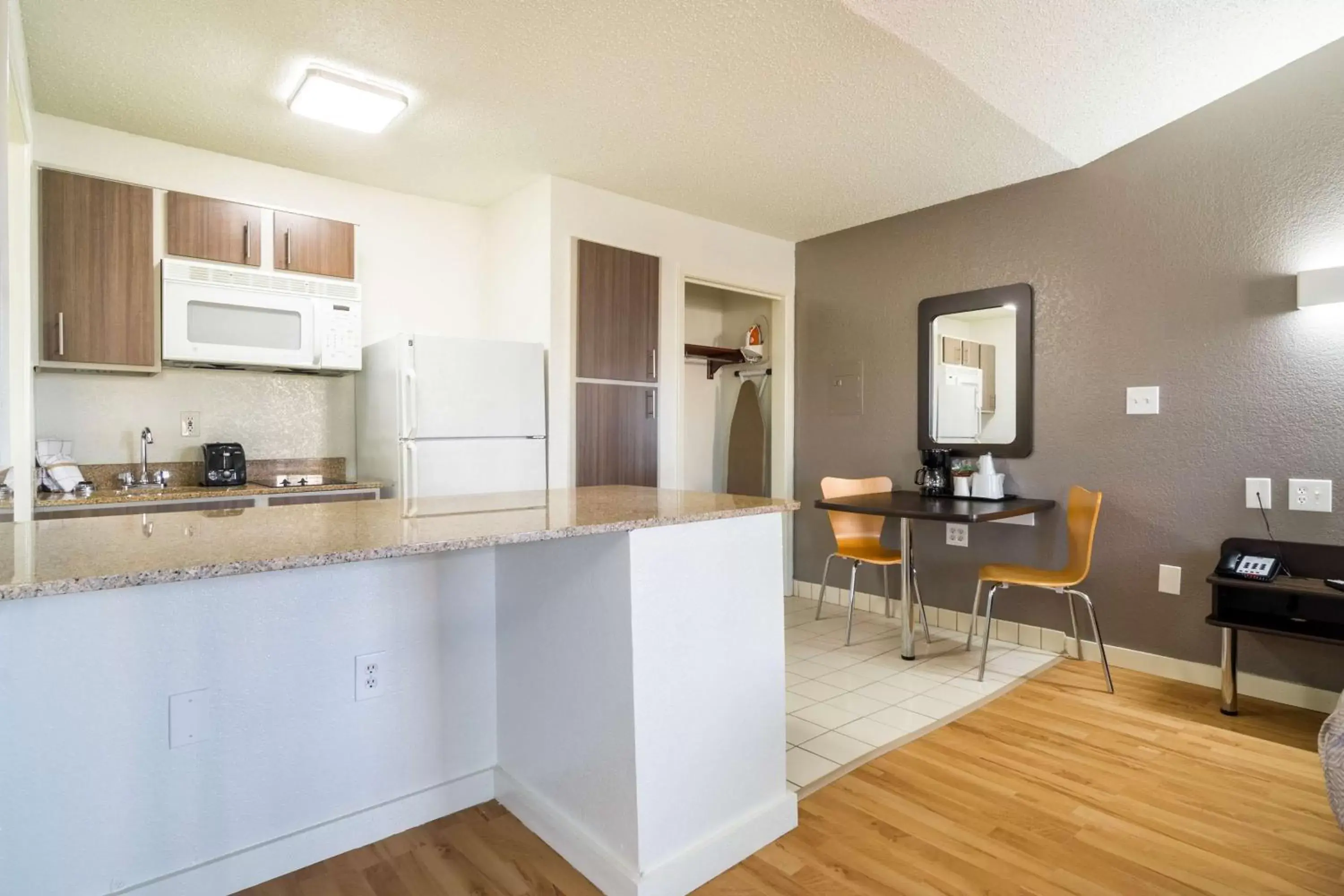 Photo of the whole room, Kitchen/Kitchenette in Studio 6-Plano, TX - Dallas - Plano Medical Center