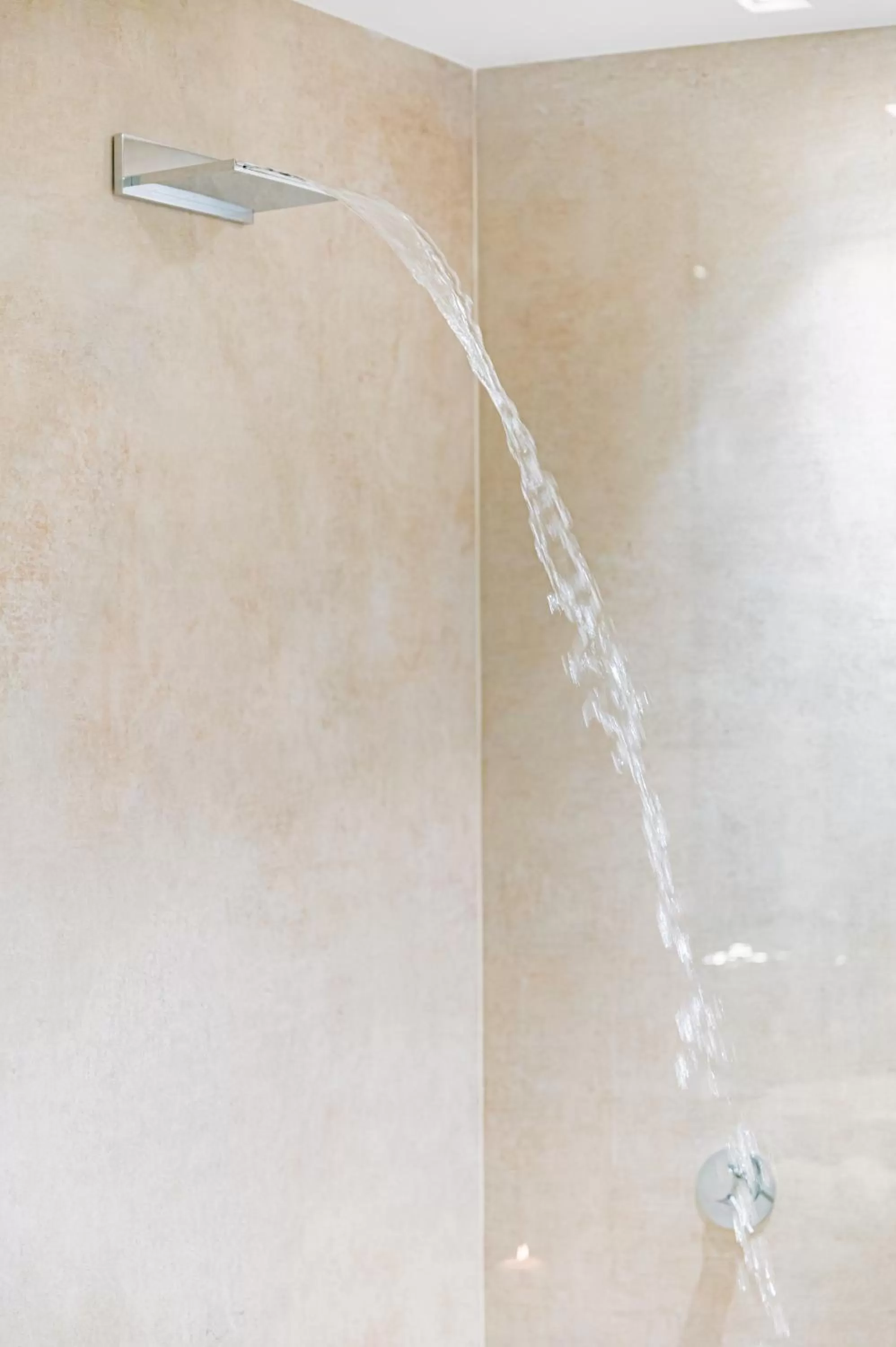 Shower in Naxi Suites