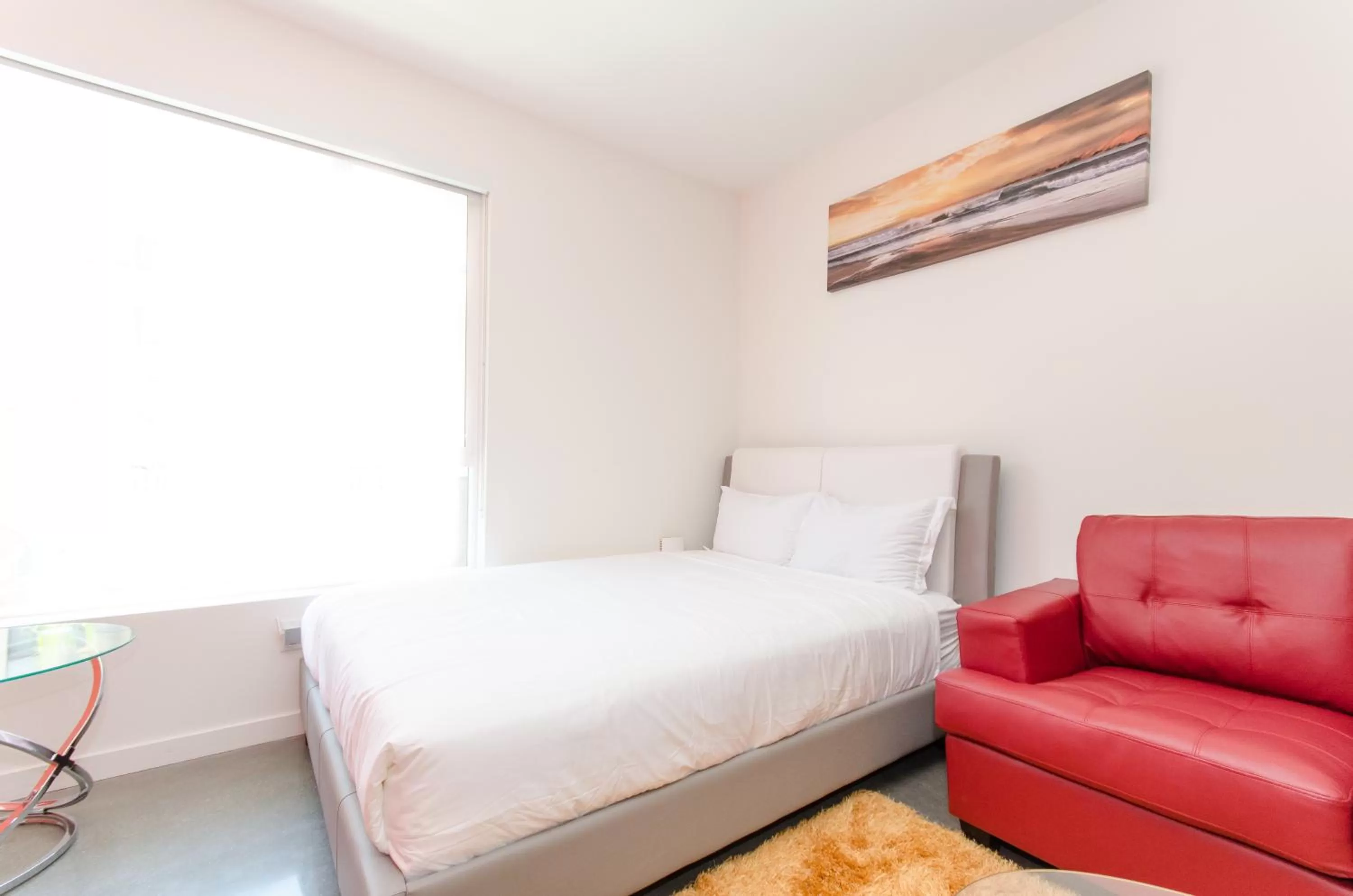 Bed in Modern Apartment Rentals