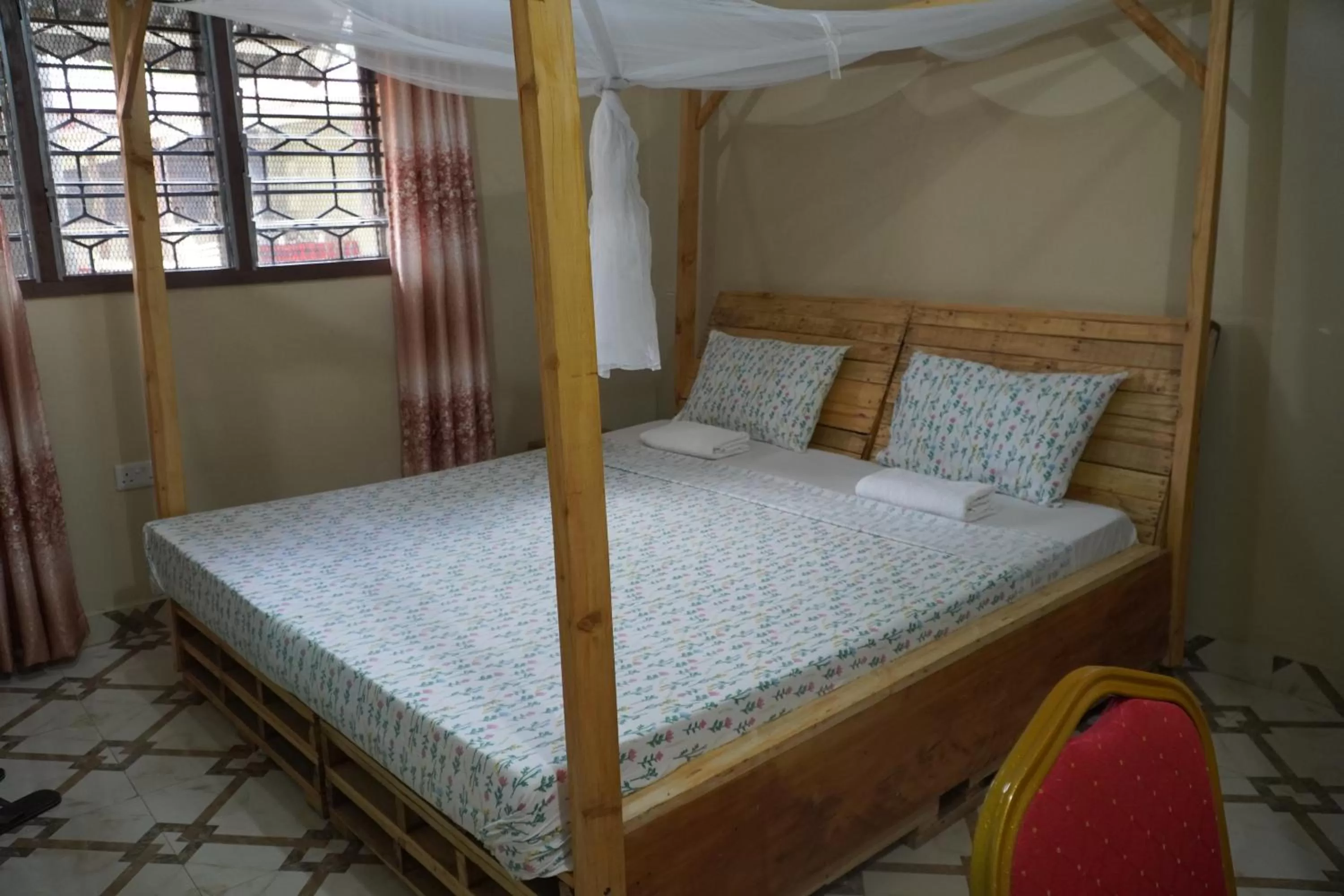 Photo of the whole room, Bed in L&J Modern Backpackers Kinondoni