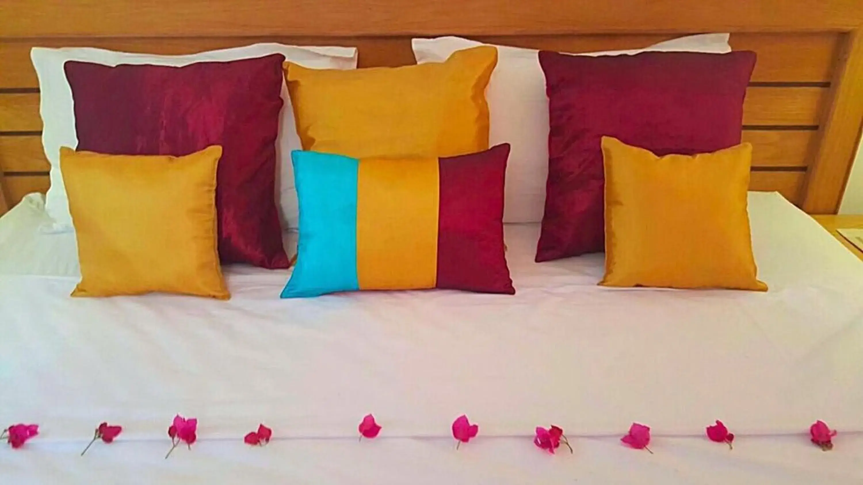Bed in Ocean Villas Apart Hotel