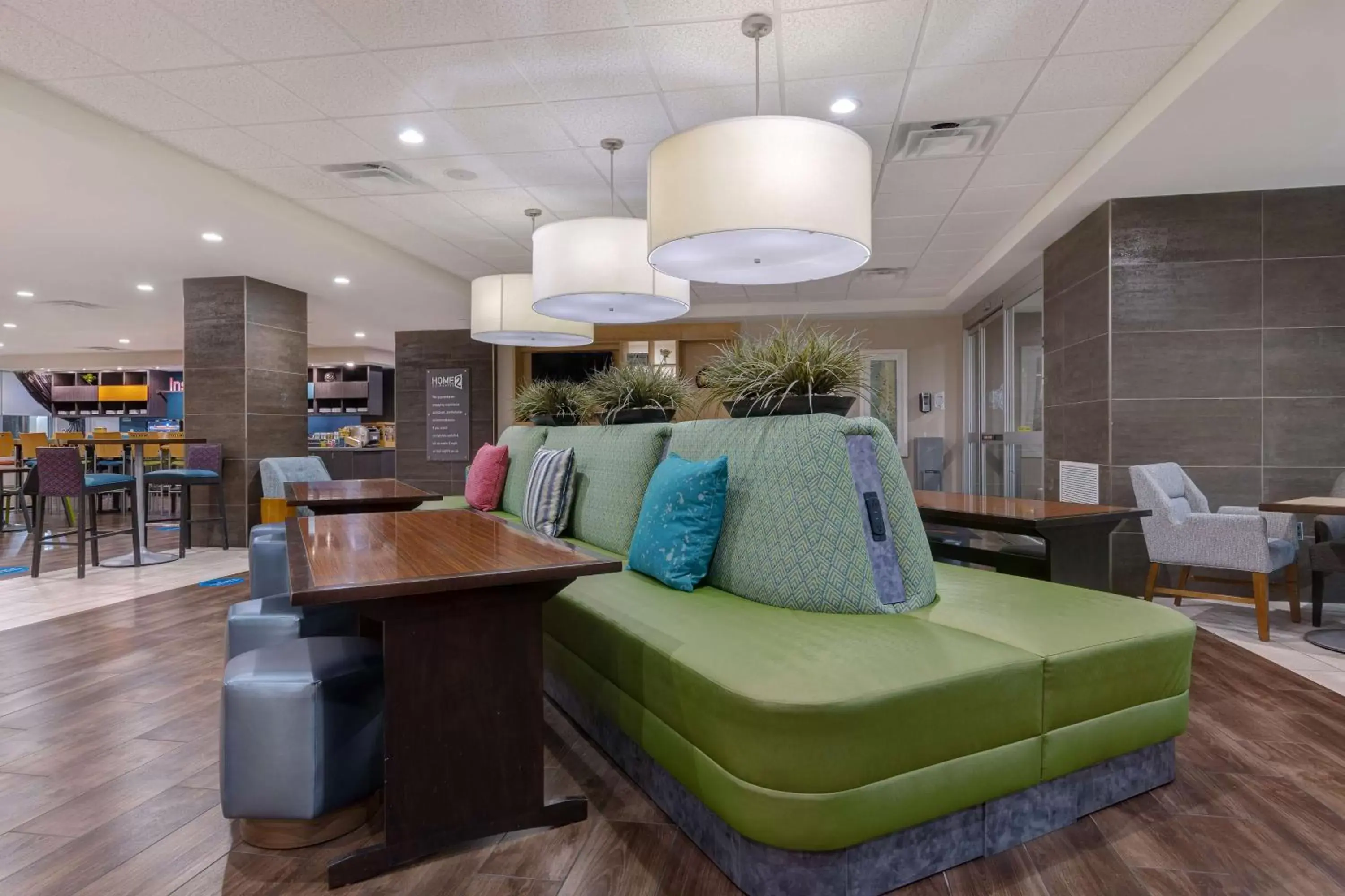 Communal lounge/ TV room, Lobby/Reception in Home2 Suites by Hilton Orlando International Drive South